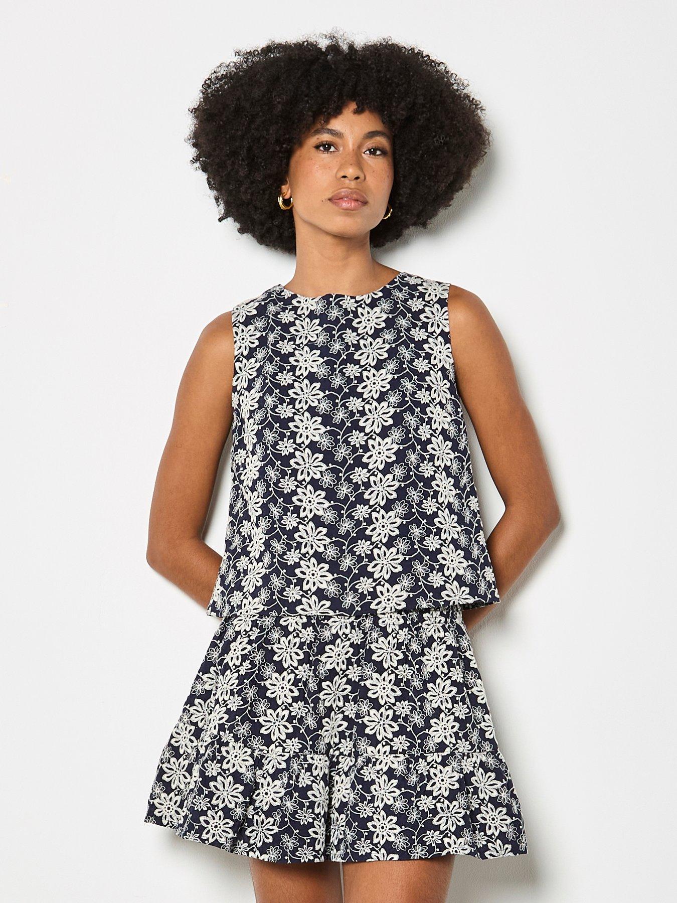 front image of apricot-embroidered-floral-top