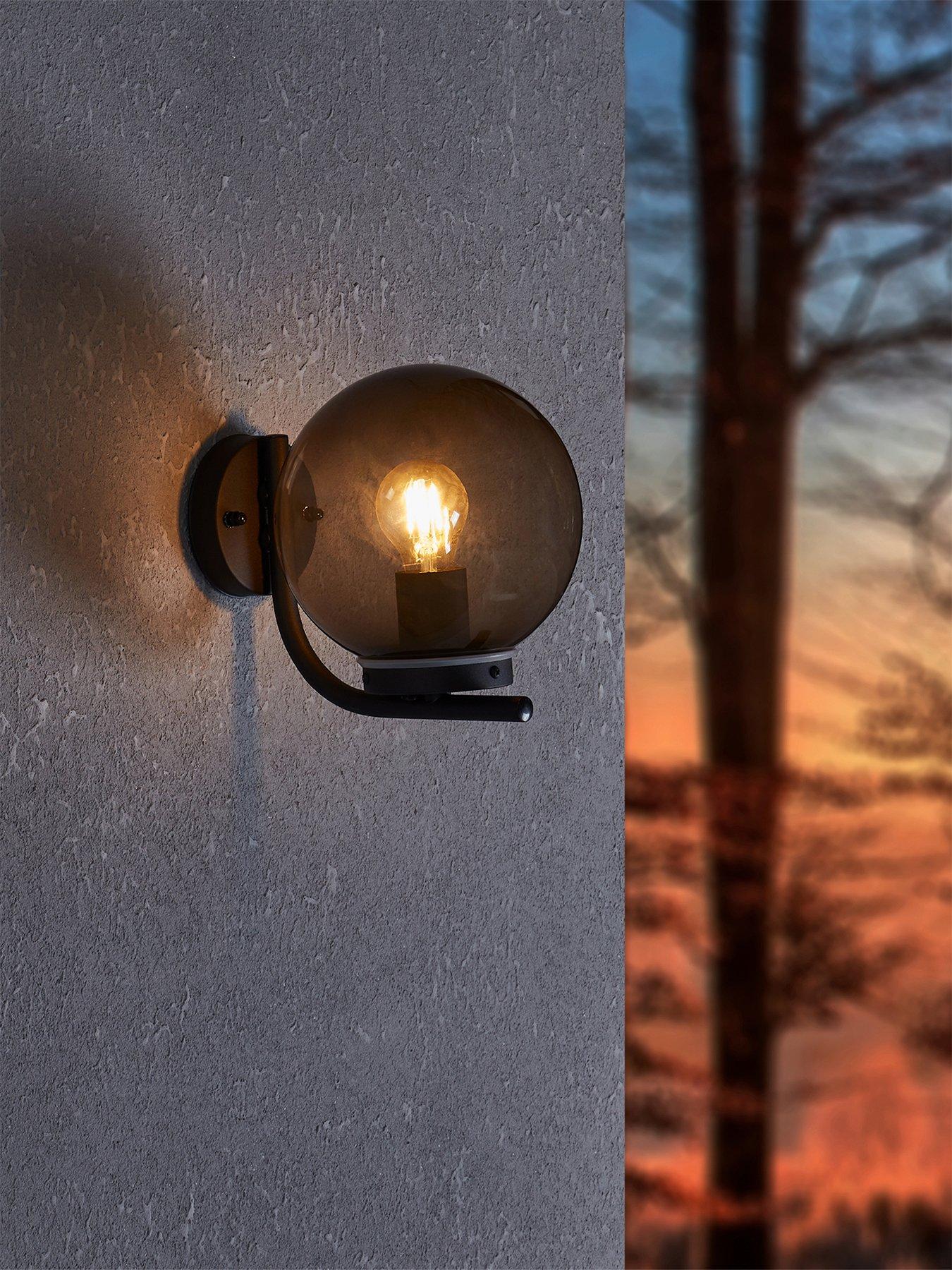 Image 1 of 4 of Eglo Taverna Black Transparent Globe Outdoor Wall Light