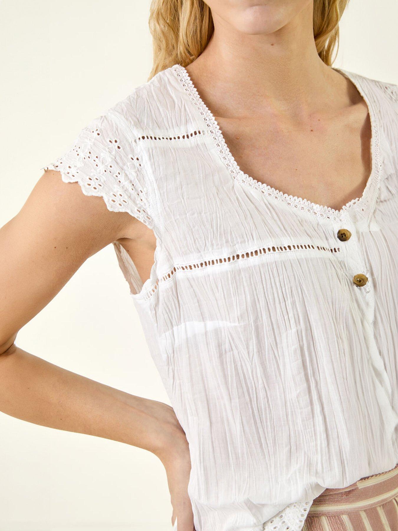  image of roman-cotton-broderie-hem-blouse