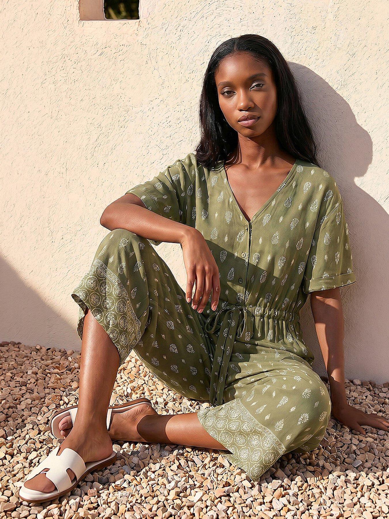 front image of roman-petite-border-print-cropped-jumpsuit