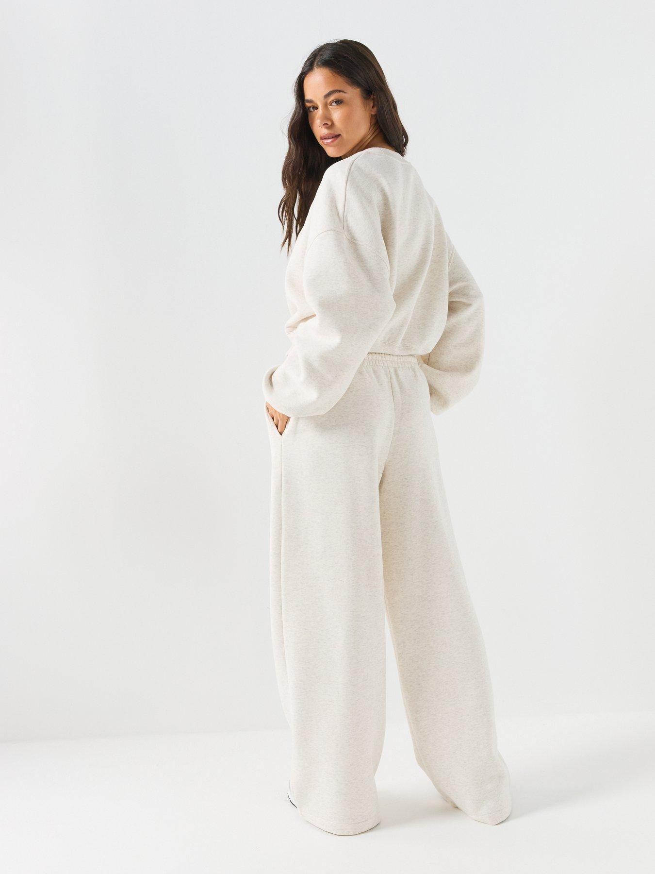 Image 5 of 6 of New Balance Women's Trackside Fleece Crew Neck Sweatshirt - Cream