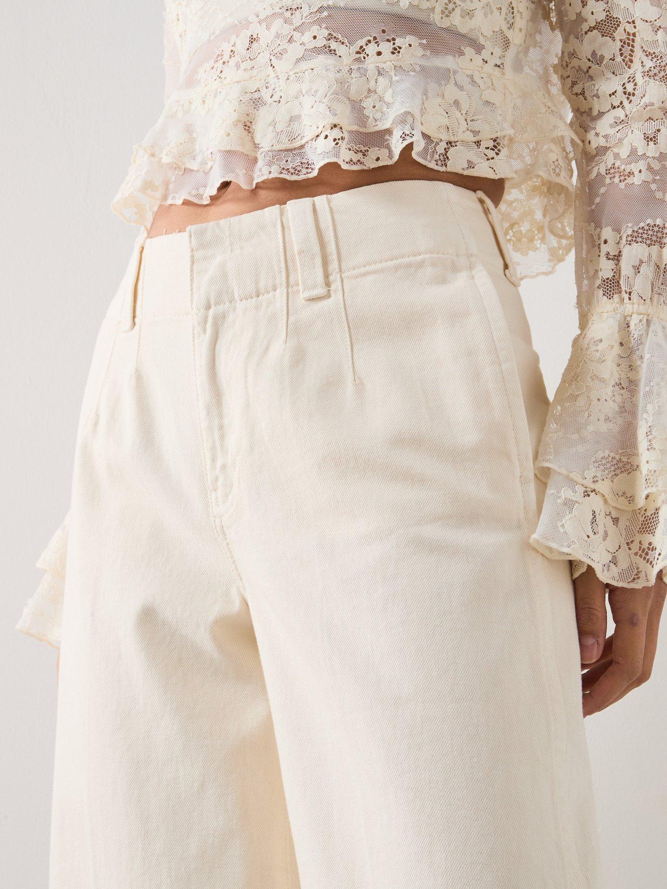  image of mango-wide-leg-mid-rise-jeans-white