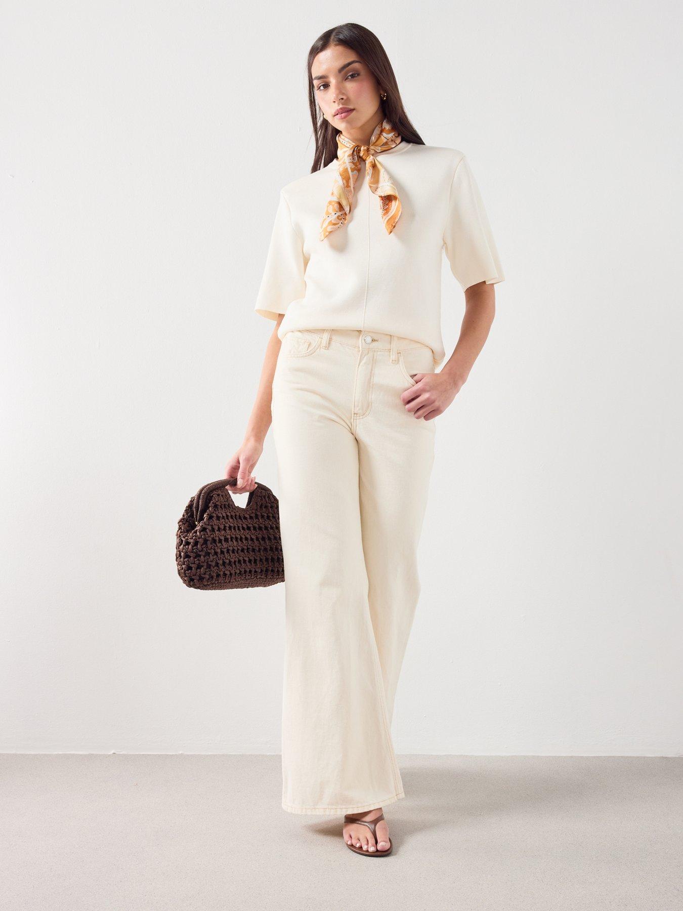  image of mango-mid-rise-flared-jeans-cream