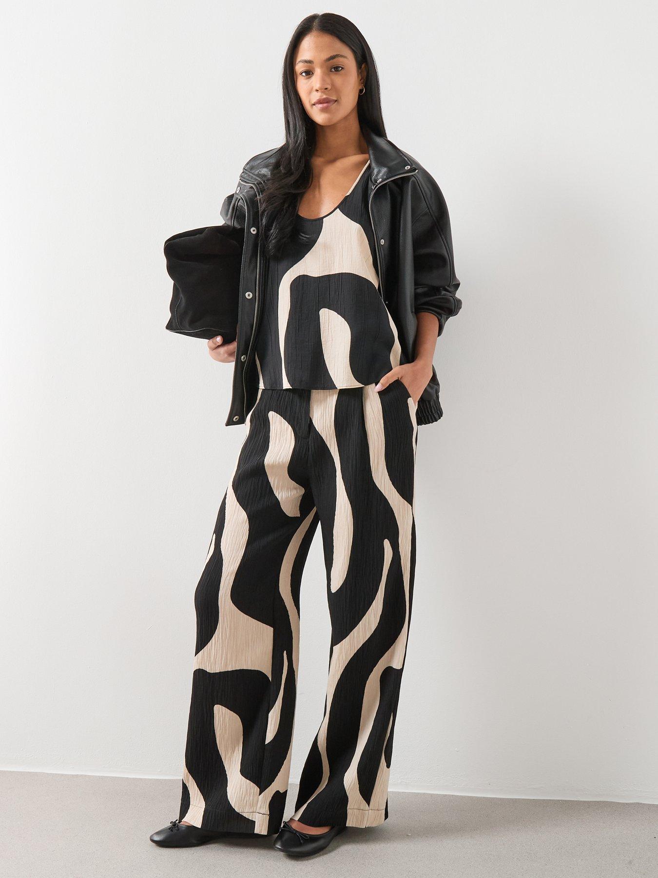  image of mango-printed-crop-top-black