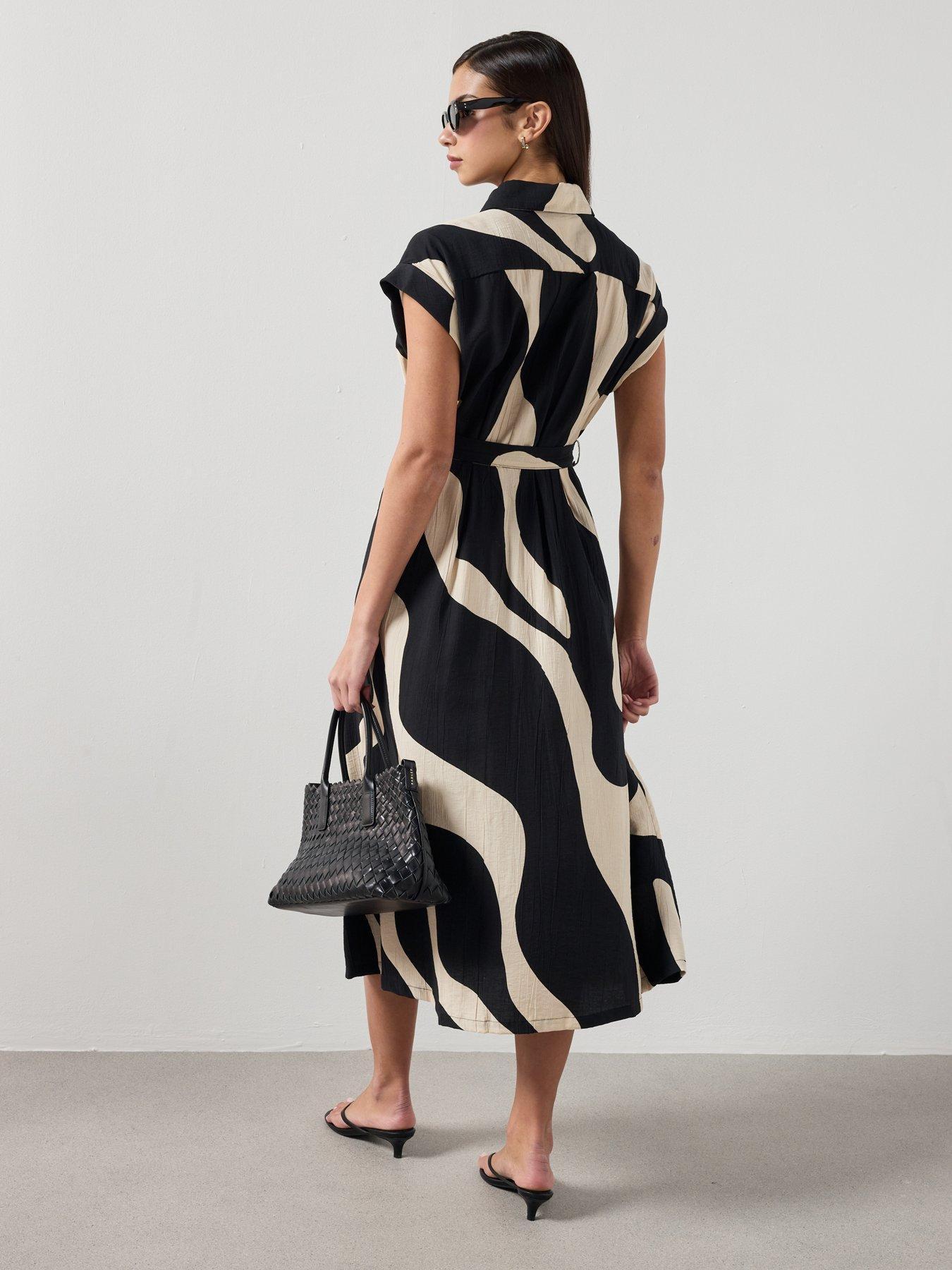 image of mango-printed-shirt-dress-black