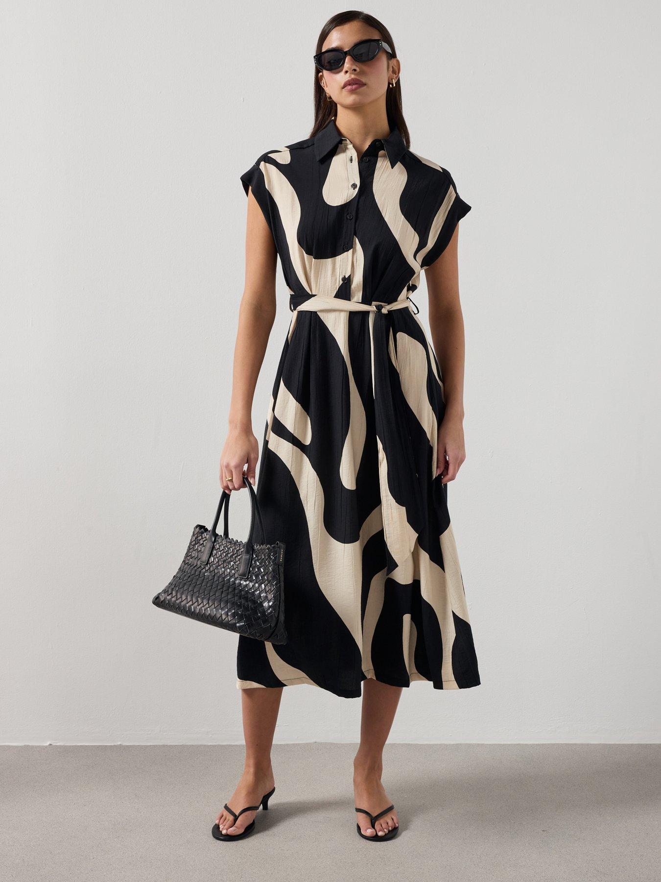  image of mango-printed-shirt-dress-black