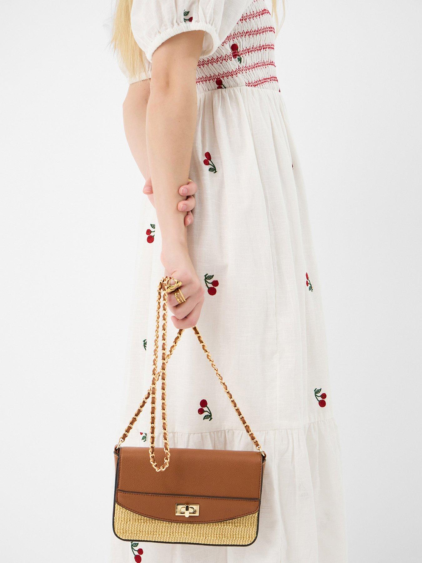  image of accessorize-twistlock-raffia-crossbody-bag