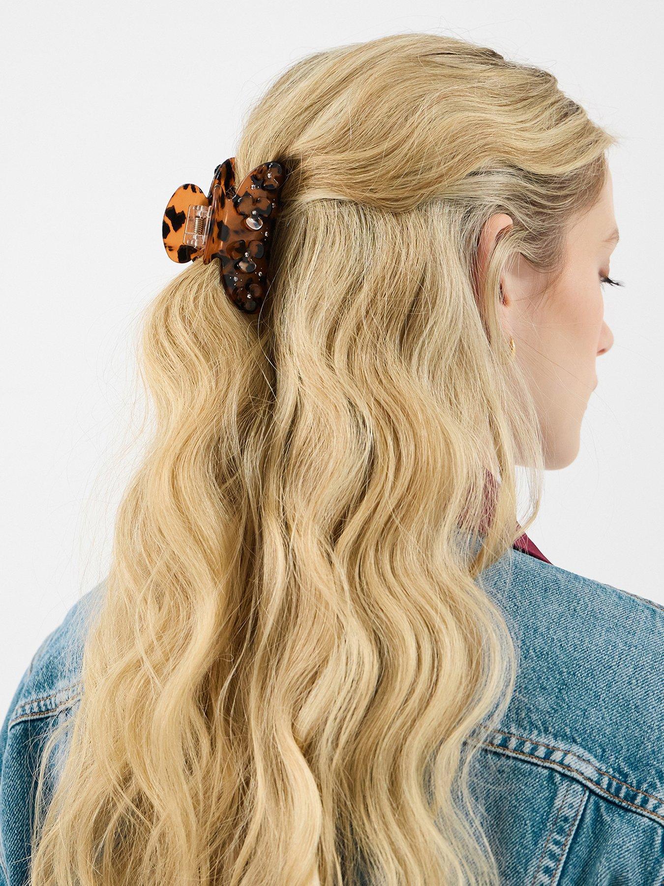  image of accessorize-flower-tort-claw-clip