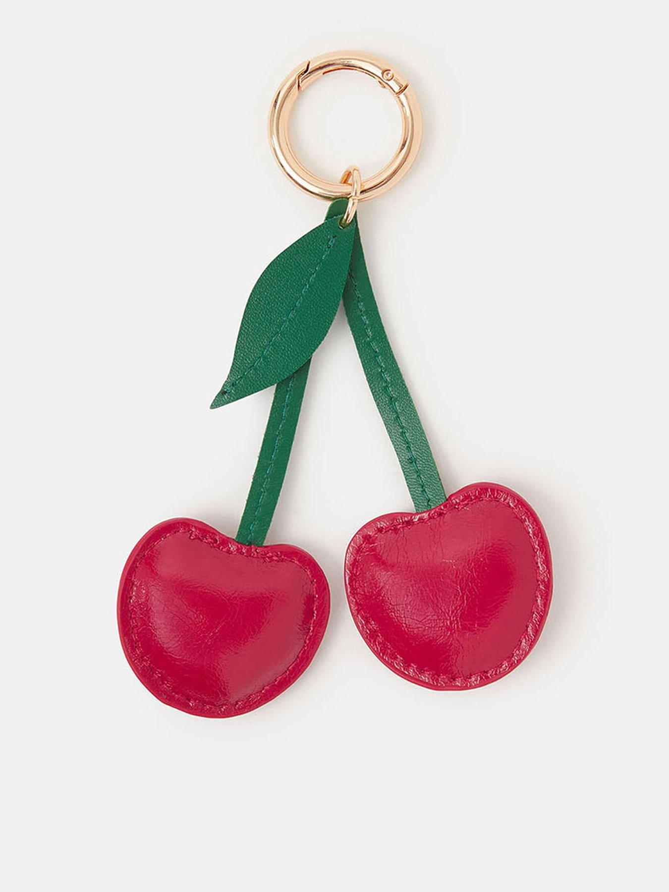 front image of accessorize-cherry-bag-charm