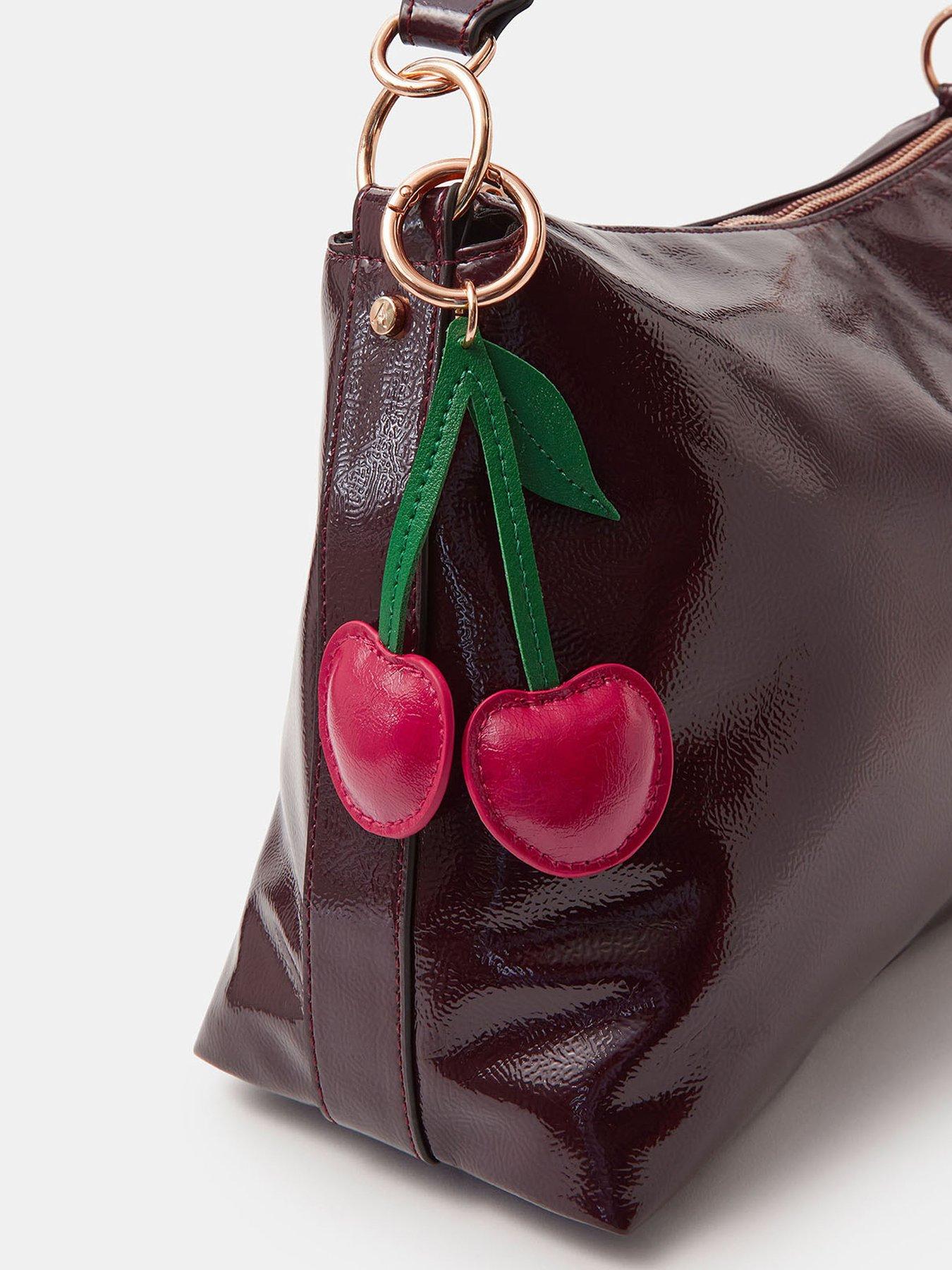  image of accessorize-cherry-bag-charm