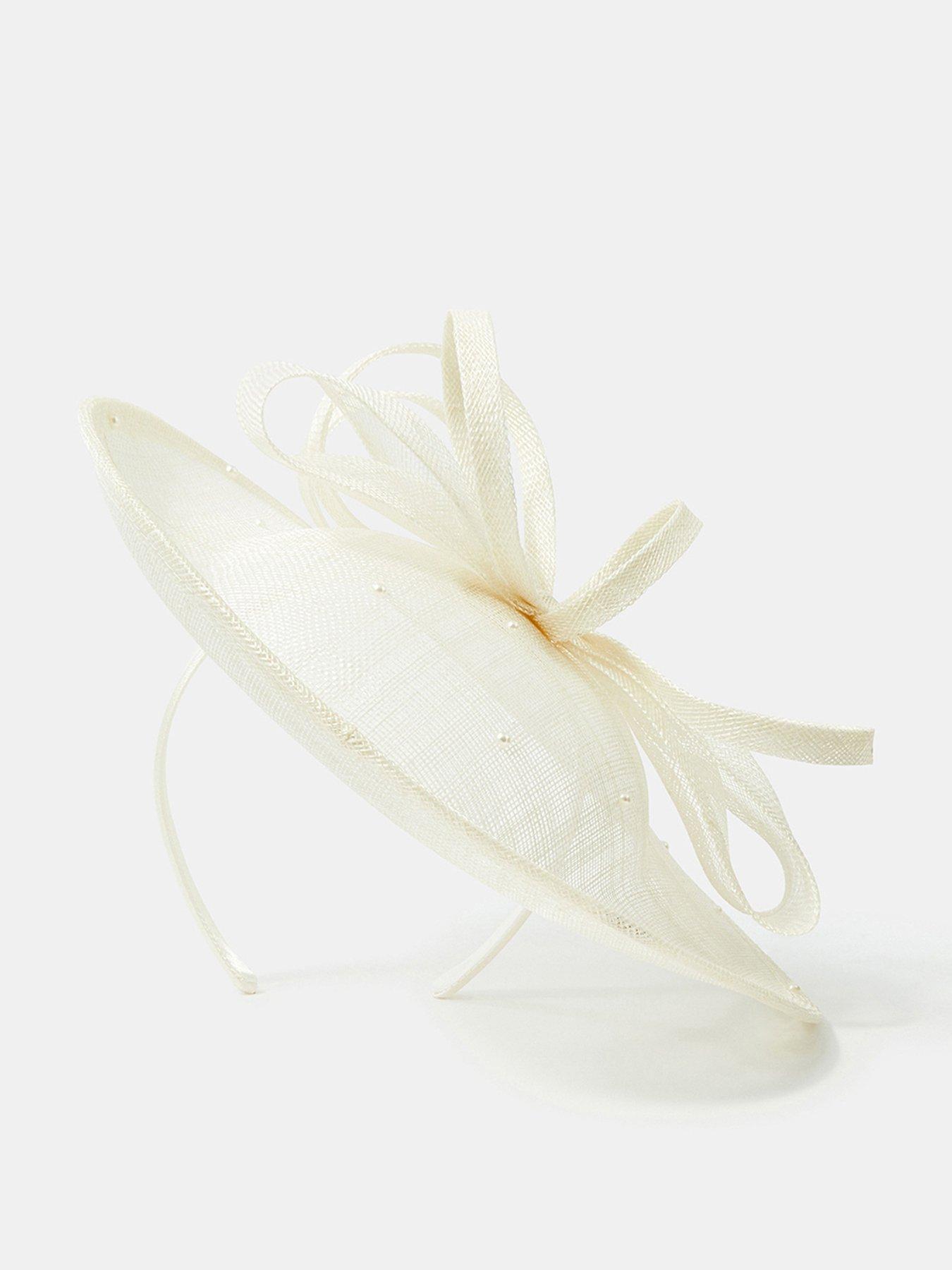 front image of accessorize-bow-pearl-disc-fascinator