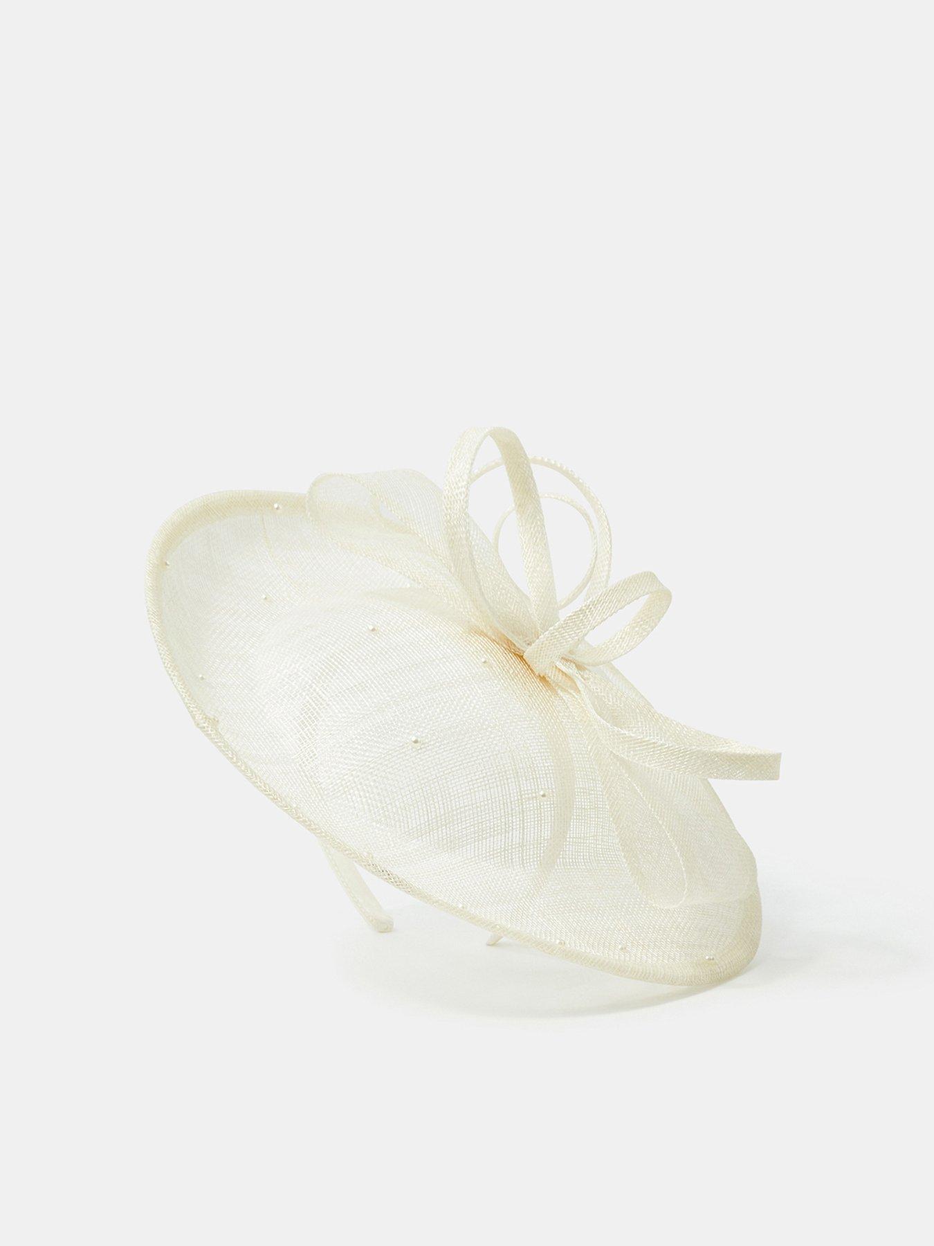  image of accessorize-bow-pearl-disc-fascinator