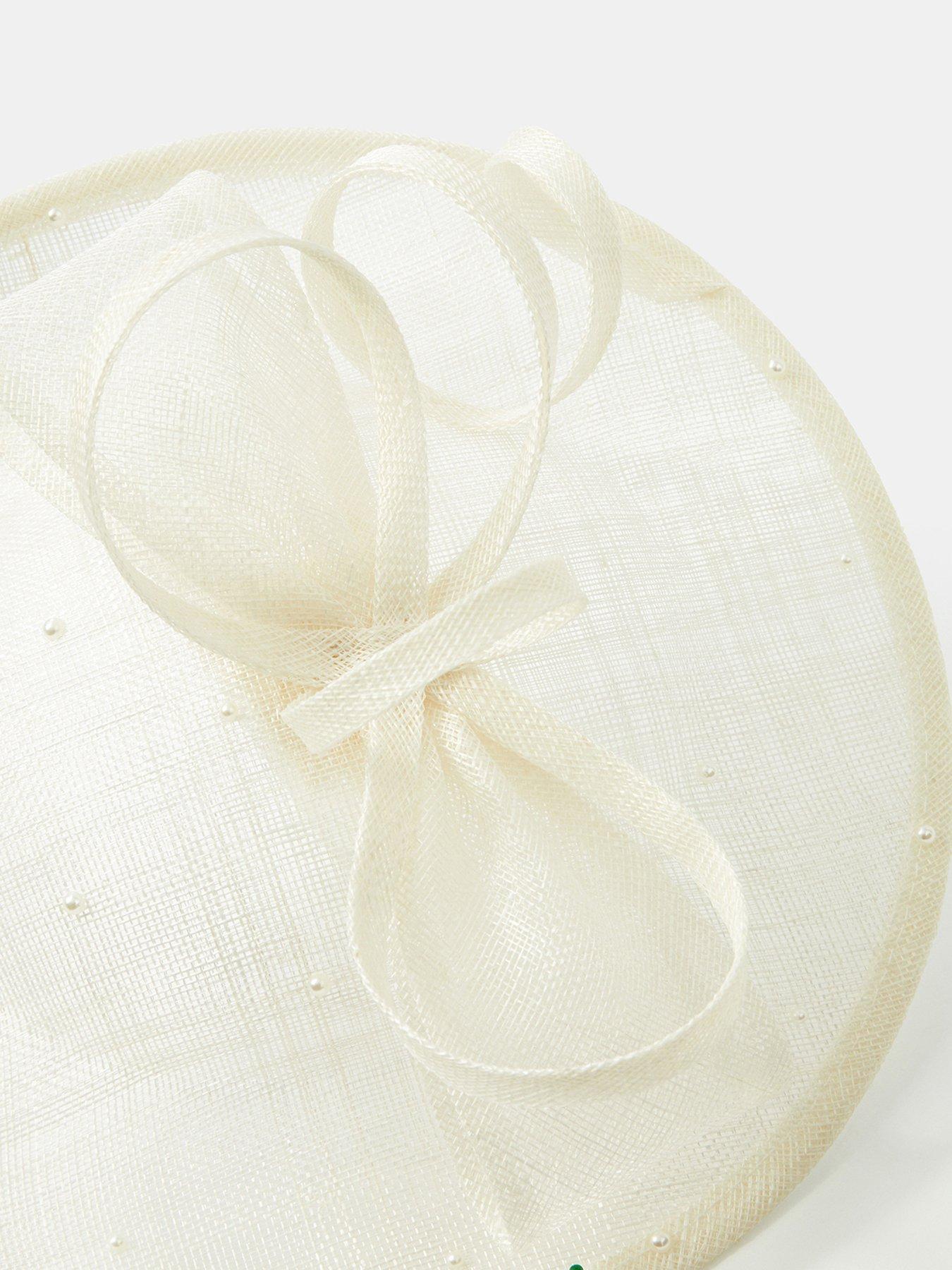  image of accessorize-bow-pearl-disc-fascinator
