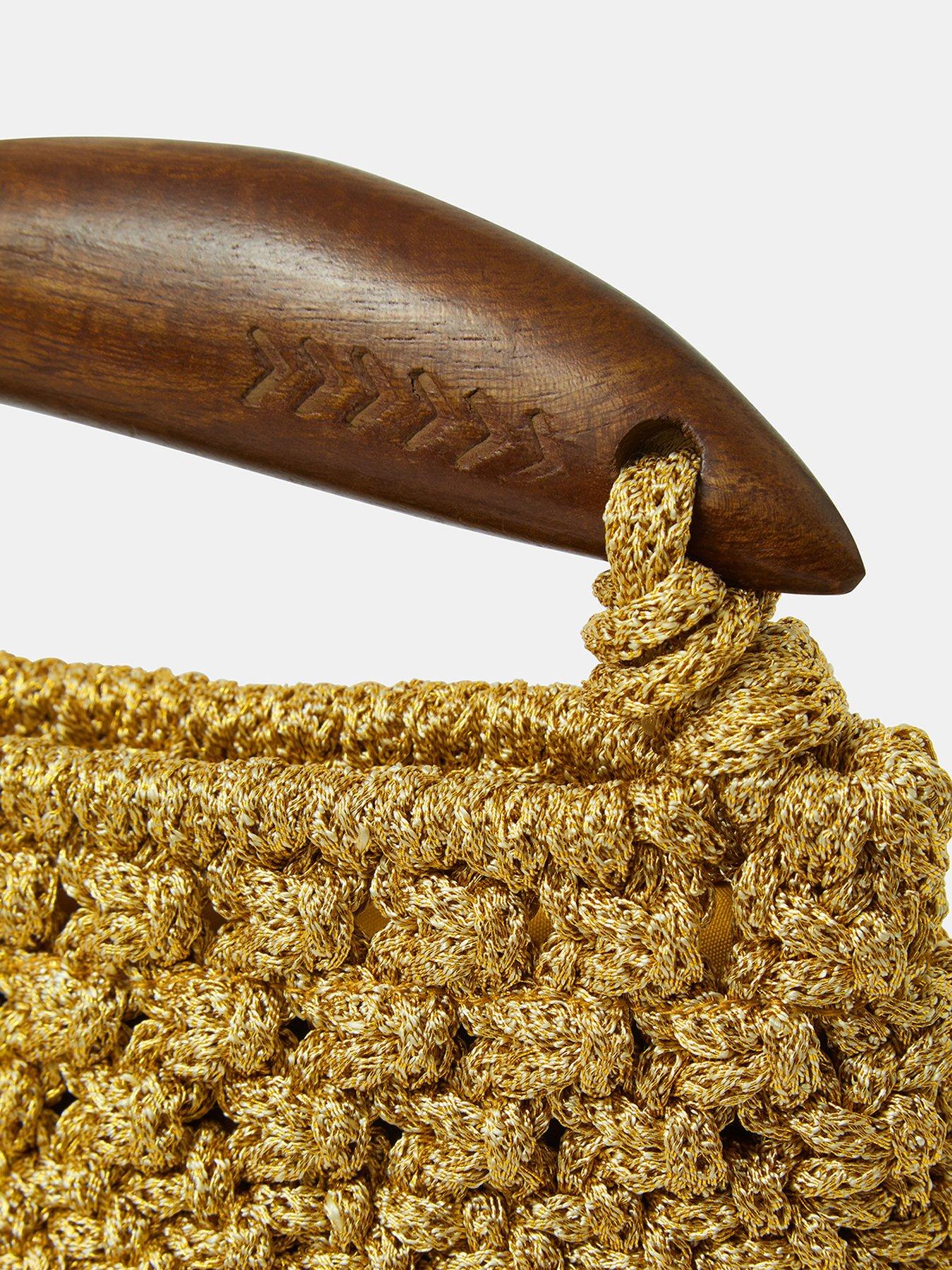  image of accessorize-fish-handle-woven-crossbody-bag