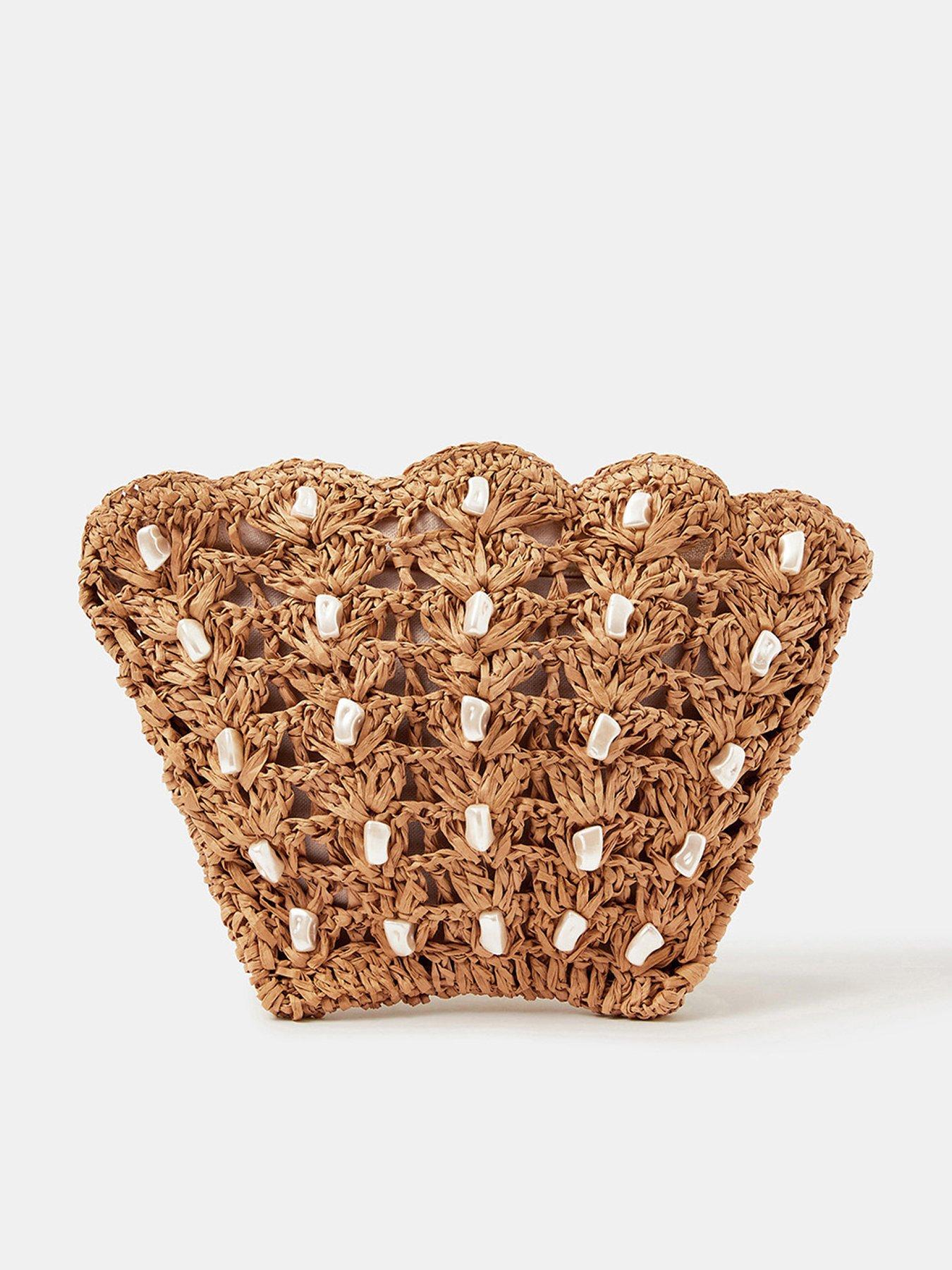 front image of accessorize-pearl-shell-wristlet-bag