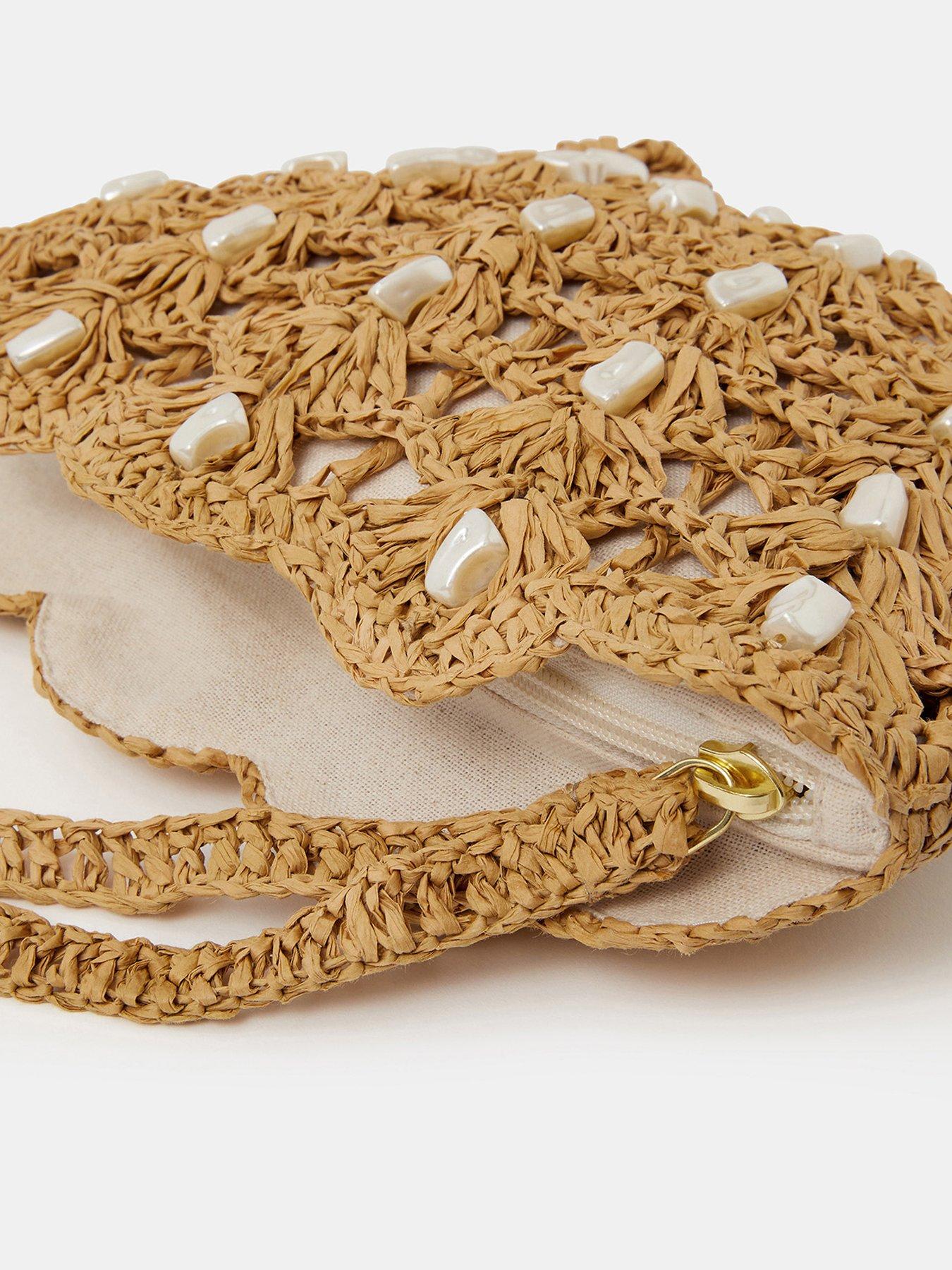  image of accessorize-pearl-shell-wristlet-bag