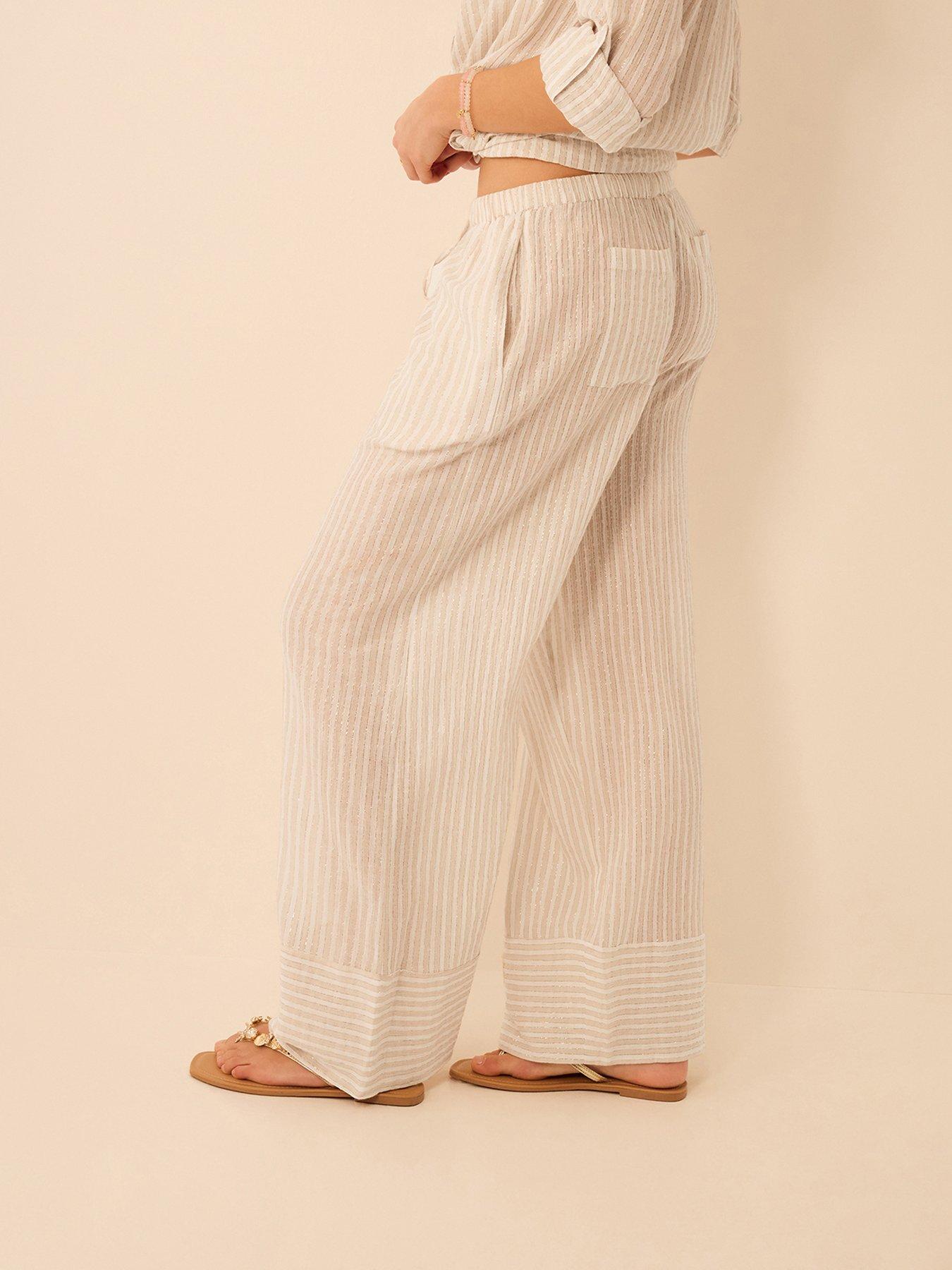  image of accessorize-shimmer-stripe-tassel-trousers