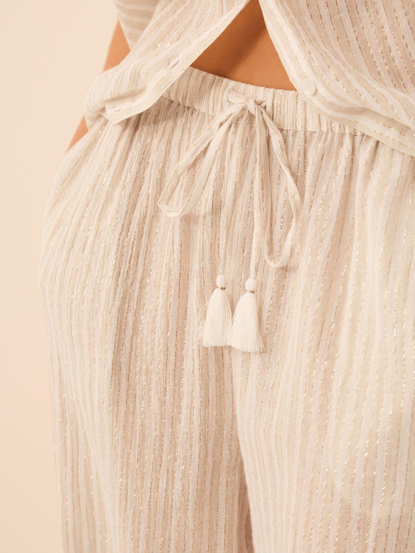  image of accessorize-shimmer-stripe-tassel-trousers