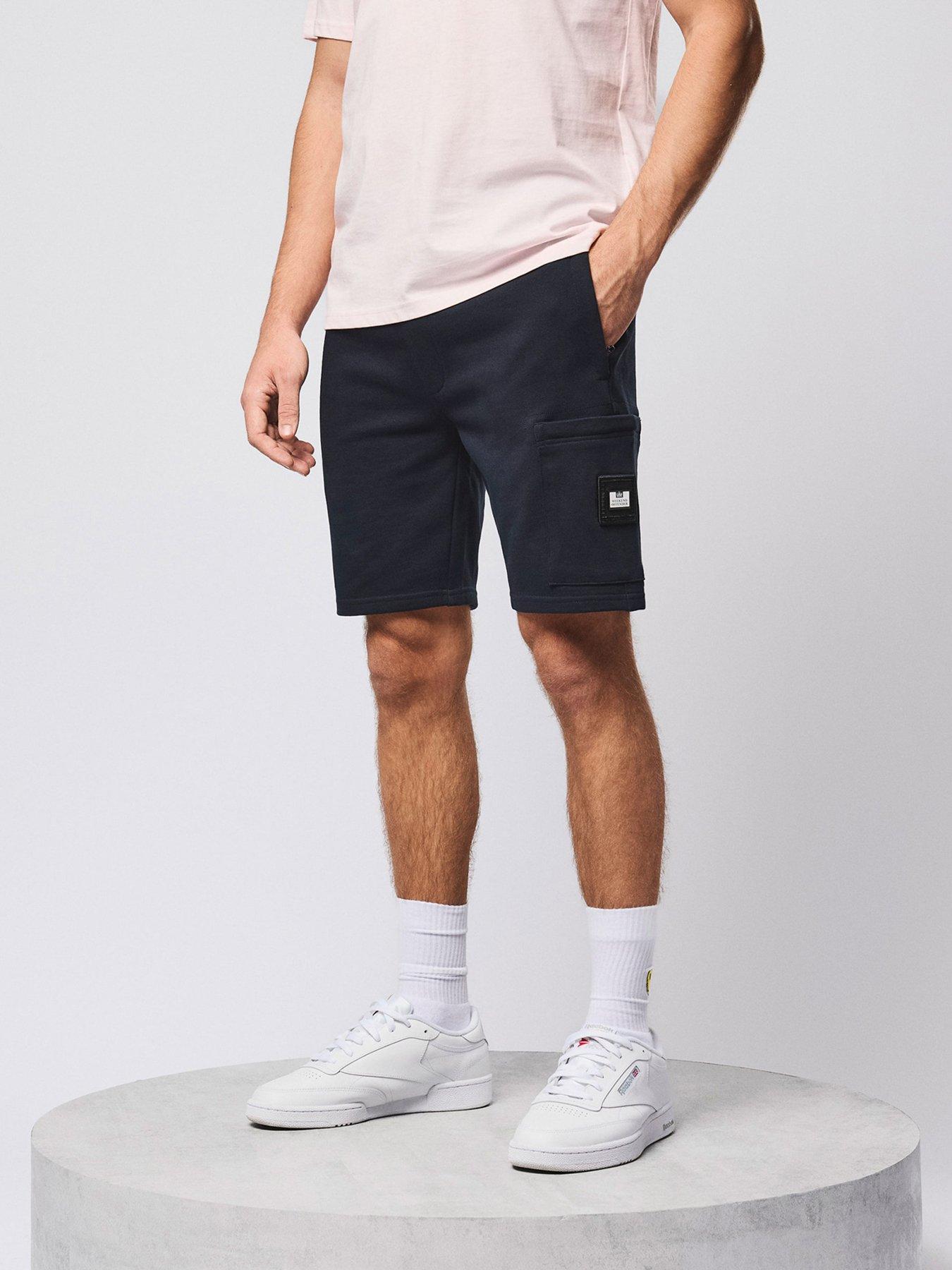 front image of weekend-offender-hawkins-cargo-sweat-shorts-navy