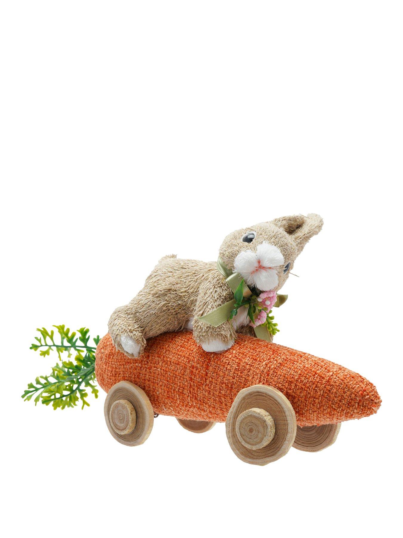  image of bristle-bunny-riding-carrot-car