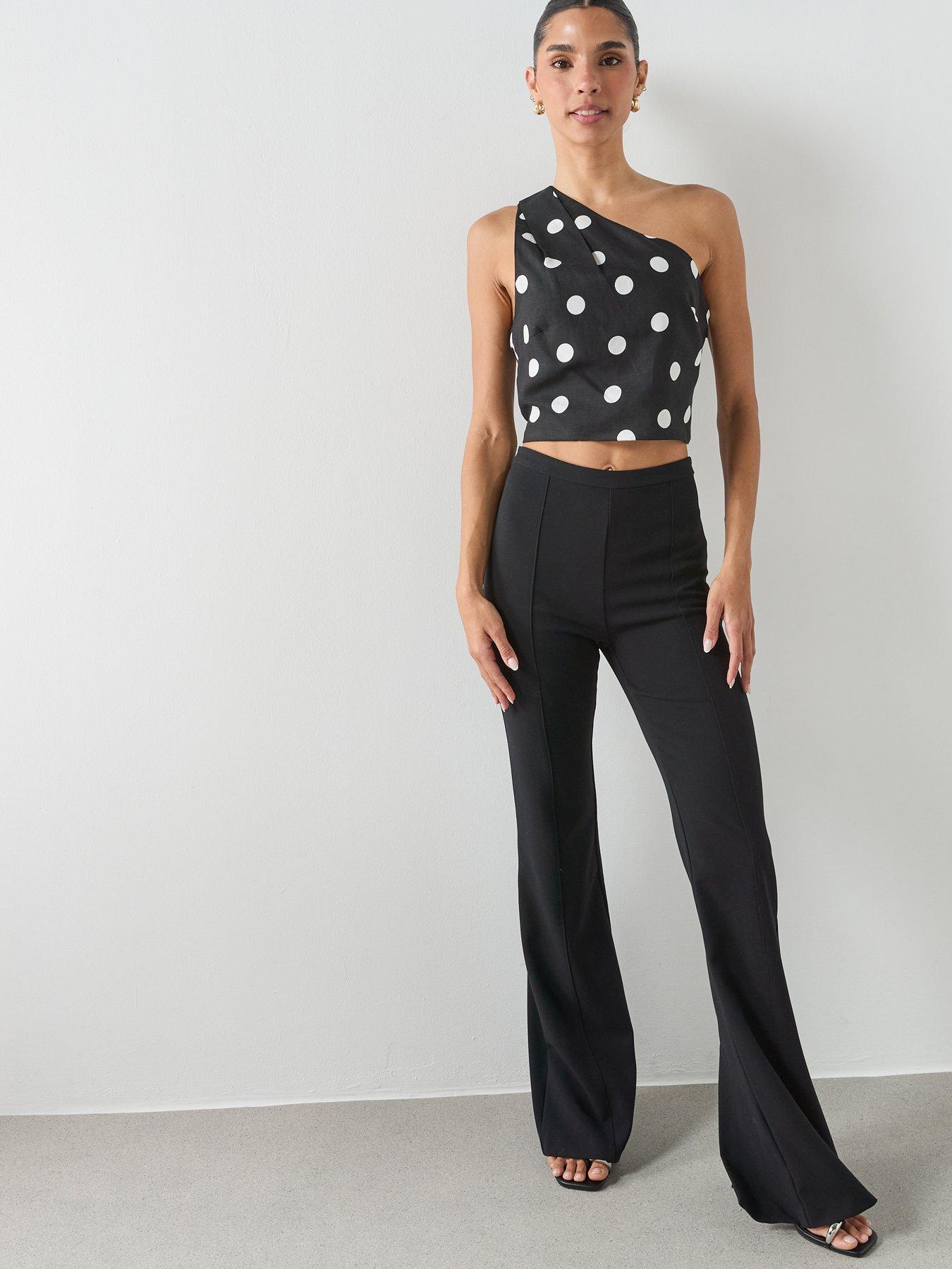  image of mango-asymmetric-polka-dot-top-black