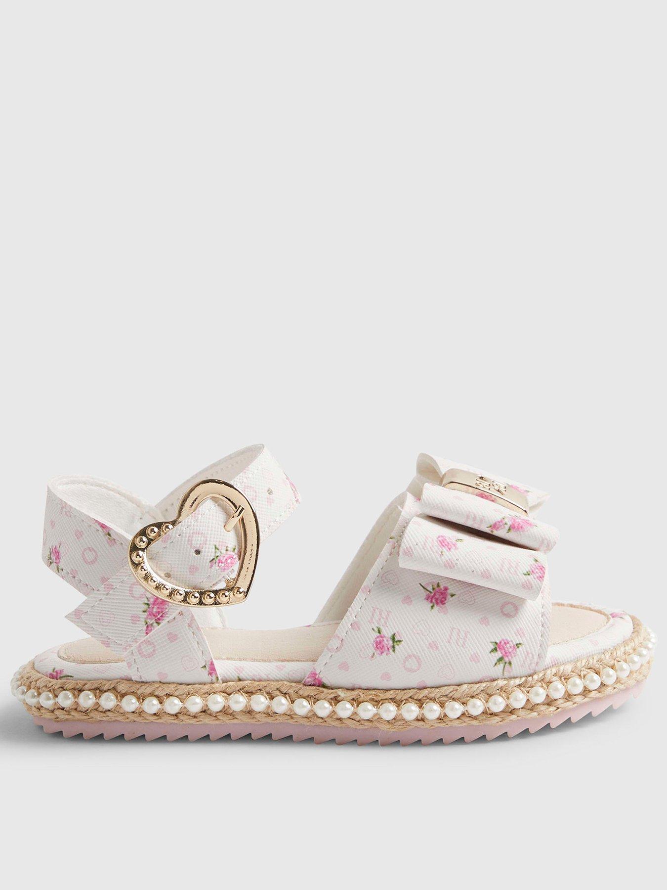 Image 1 of 5 of River Island Mini Girls Ditsy Rose Bow Sandals - White