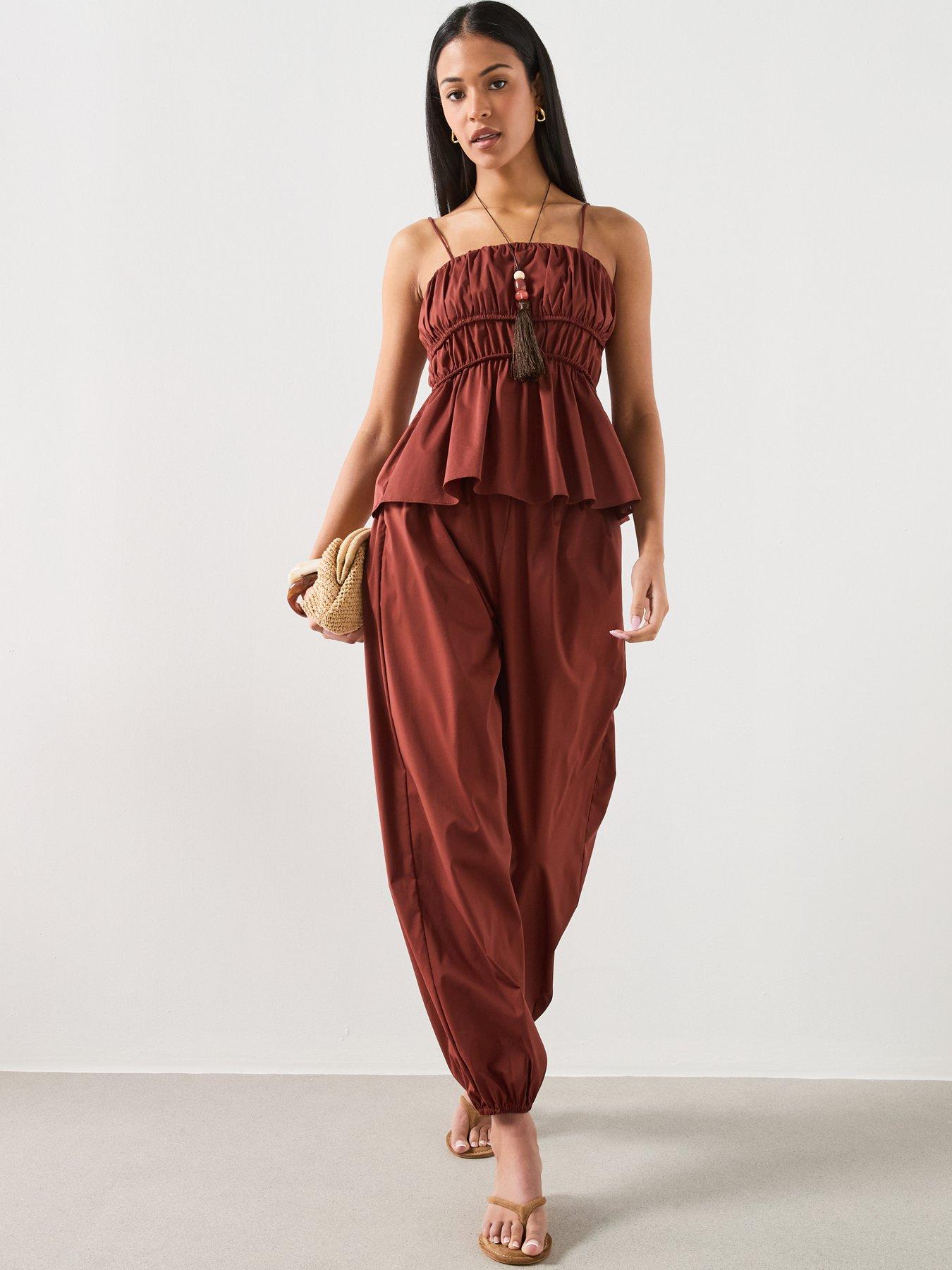 Image 3 of 6 of Mango Balloon-Style Trousers With Elasticated Waist - Brown