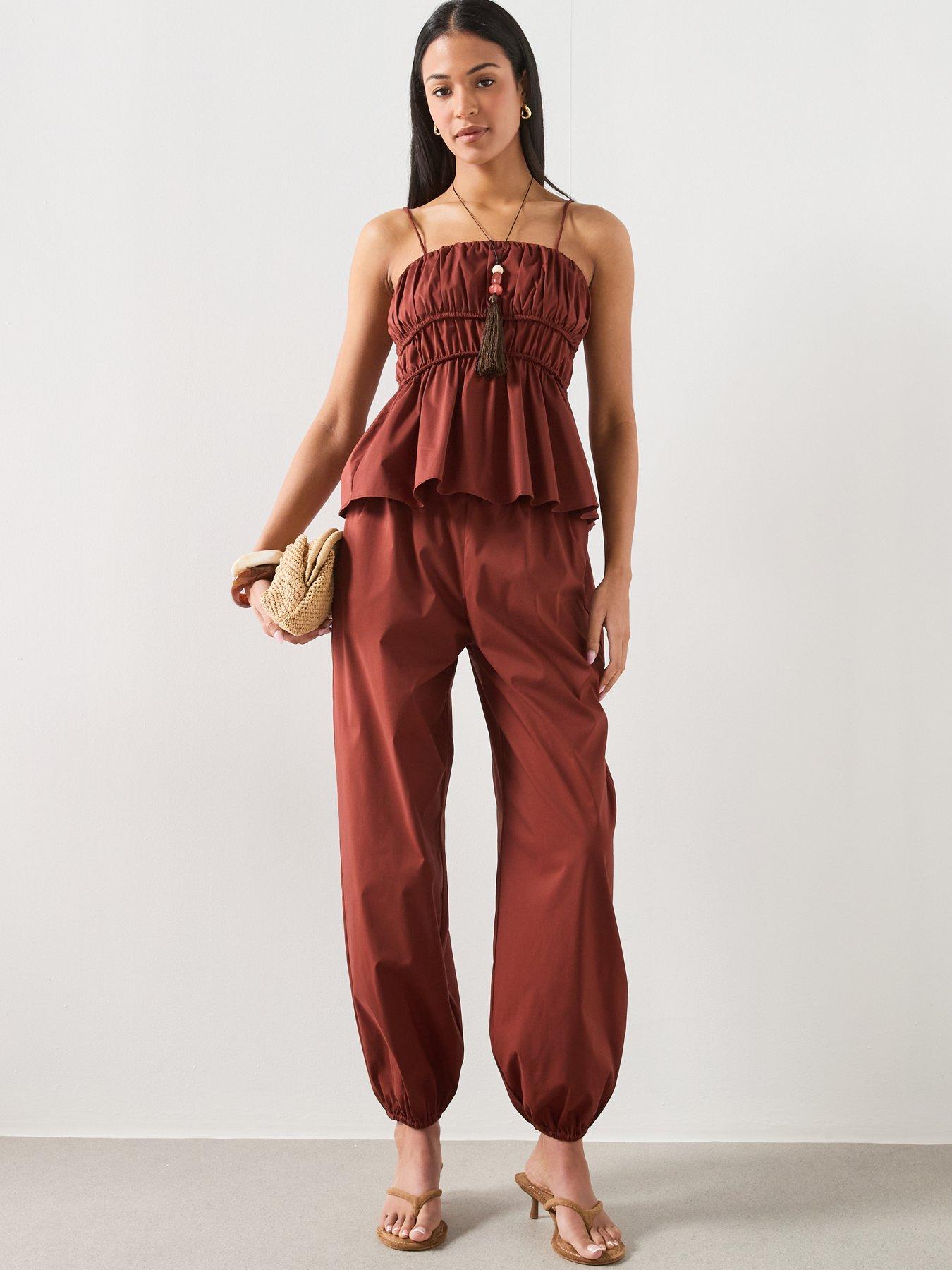 Image 6 of 6 of Mango Balloon-Style Trousers With Elasticated Waist - Brown