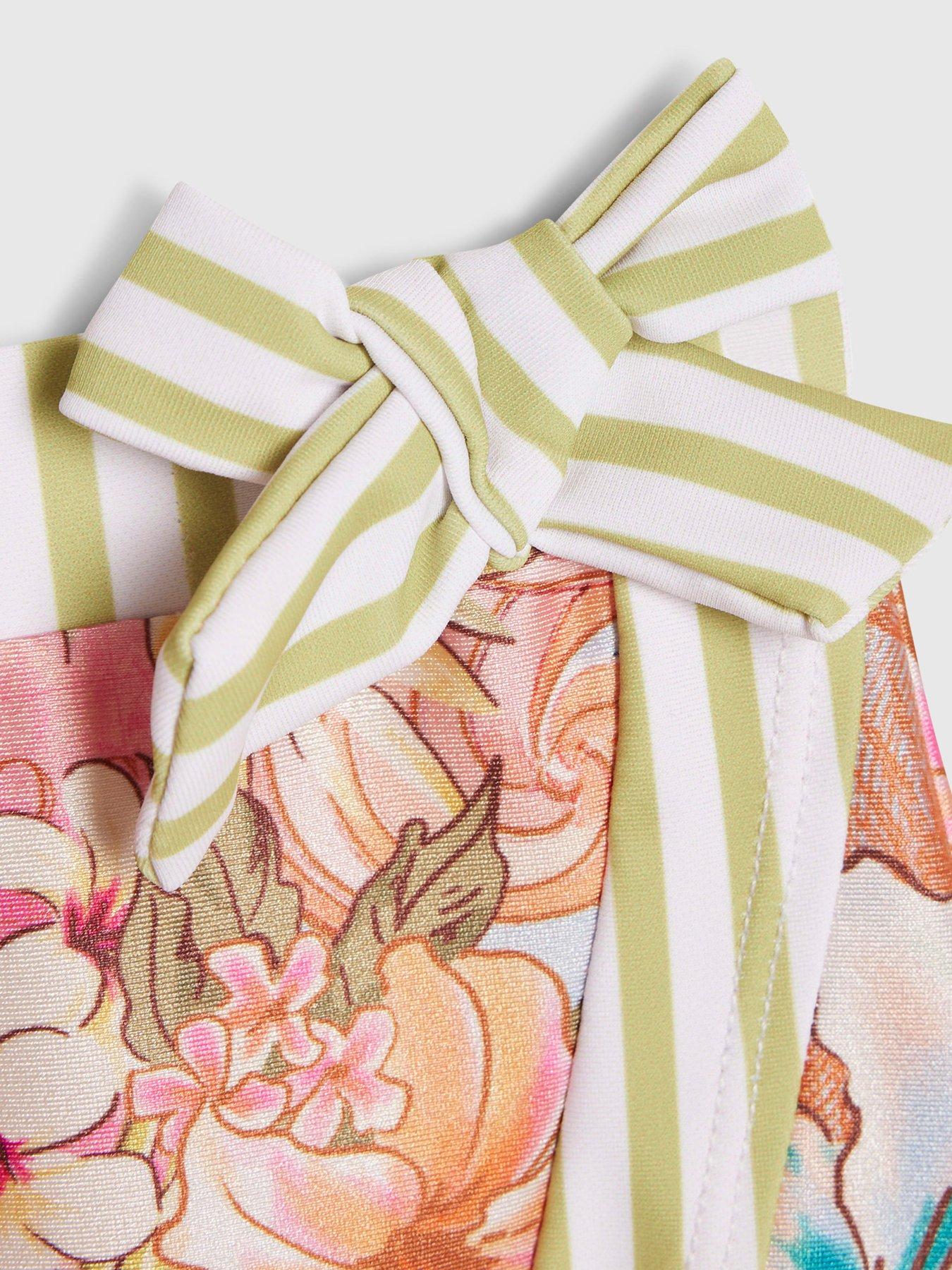 Image 4 of 5 of River Island Mini Girls Del Maar Floral Swimsuit And Skirt Set - Orange