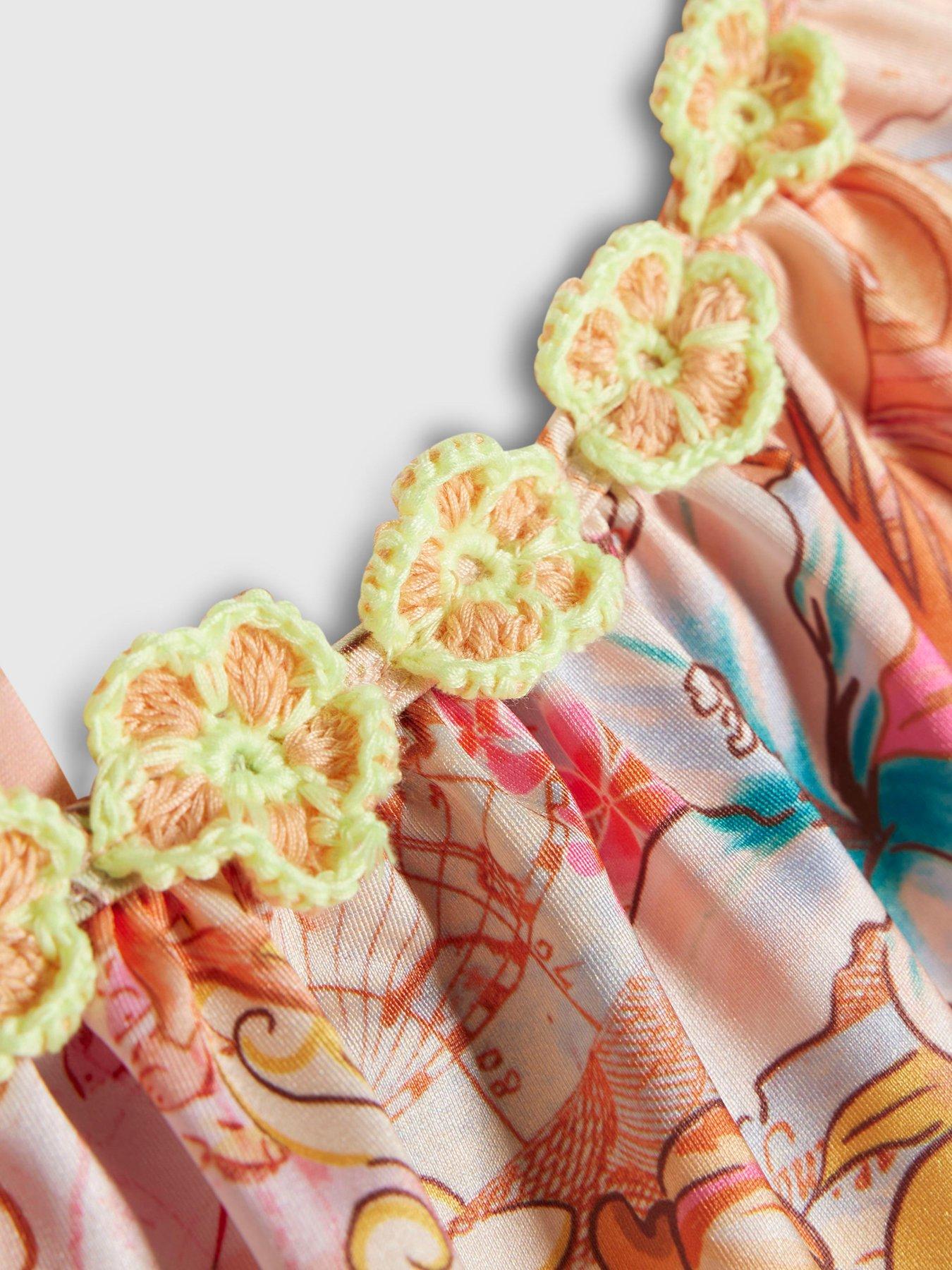 Image 5 of 5 of River Island Mini Girls Del Maar Floral Swimsuit And Skirt Set - Orange