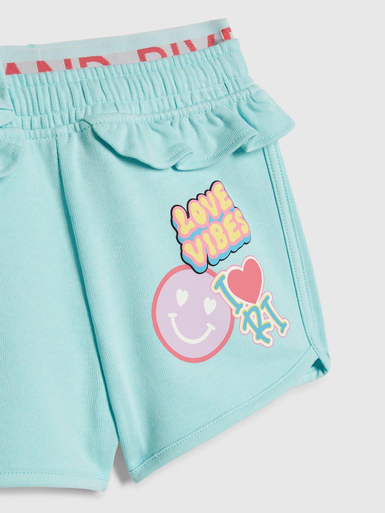 Image 4 of 5 of River Island Mini Girls Love Vibes Back Print Shorts Set - Blue - Green
