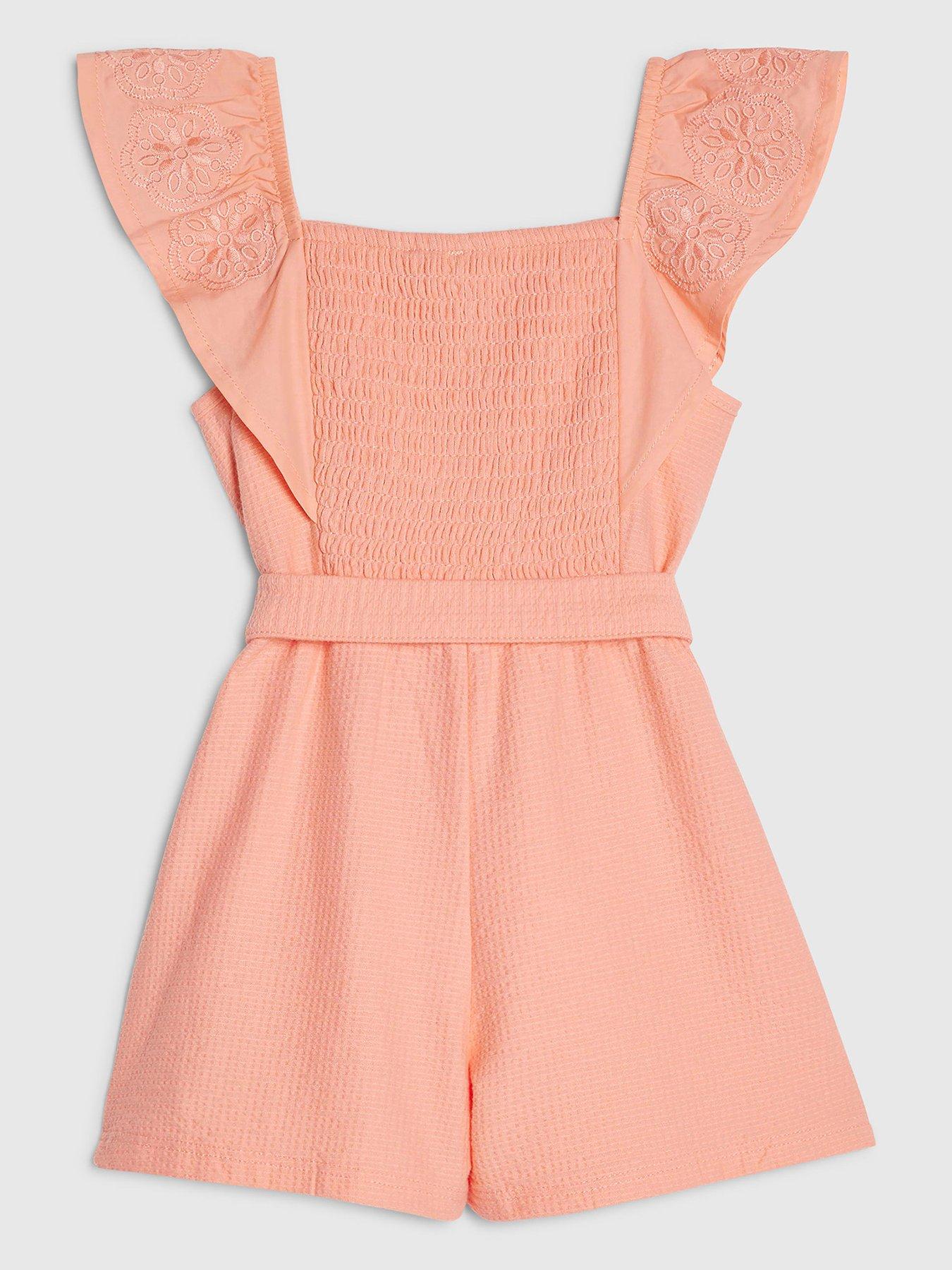 Image 2 of 3 of River Island Mini Girls Shirred Jersey Playsuit - Orange