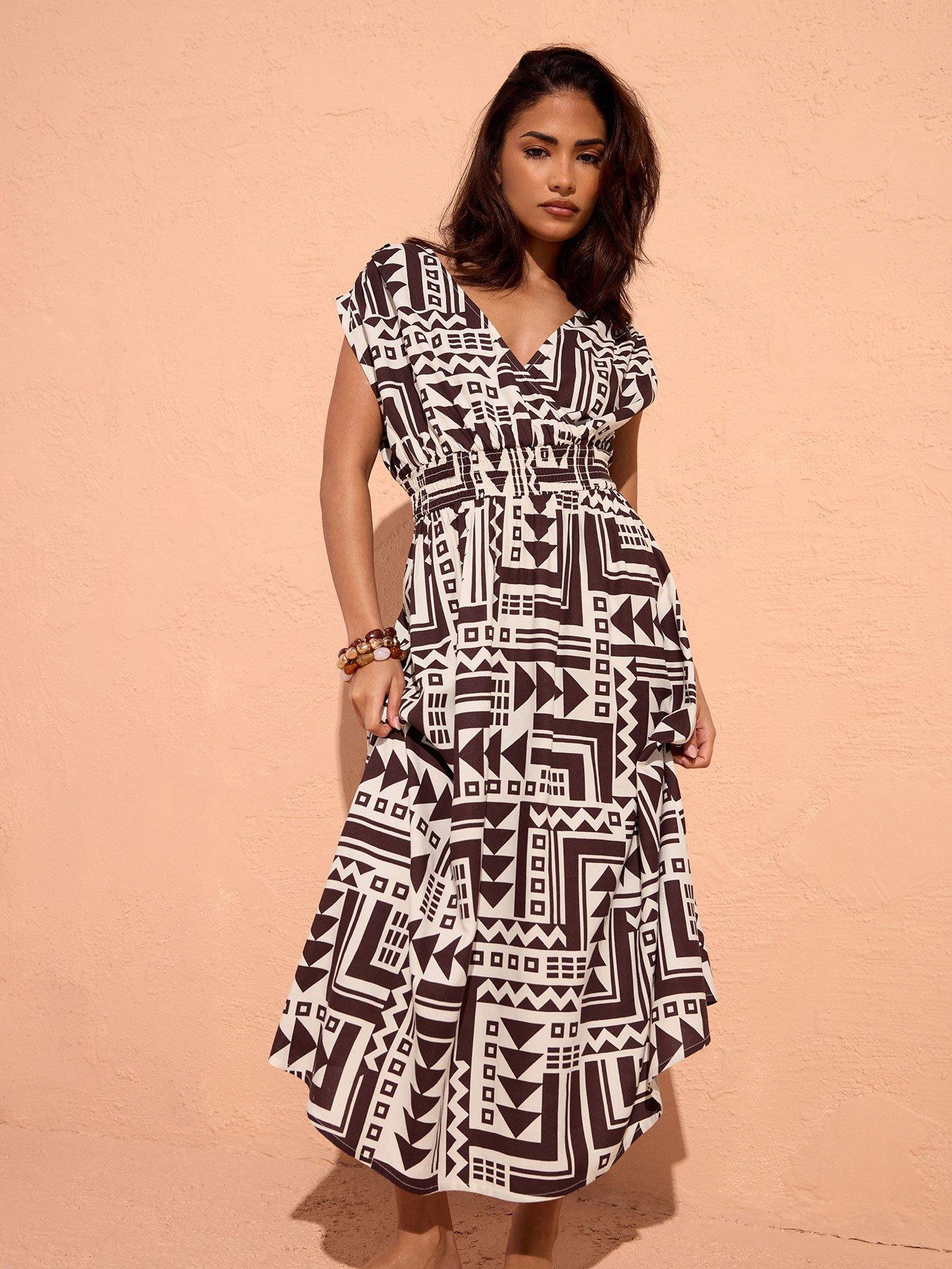 Image 1 of 6 of PixieGirl Petite Abstract Wrap Front Midi Dress - Brown