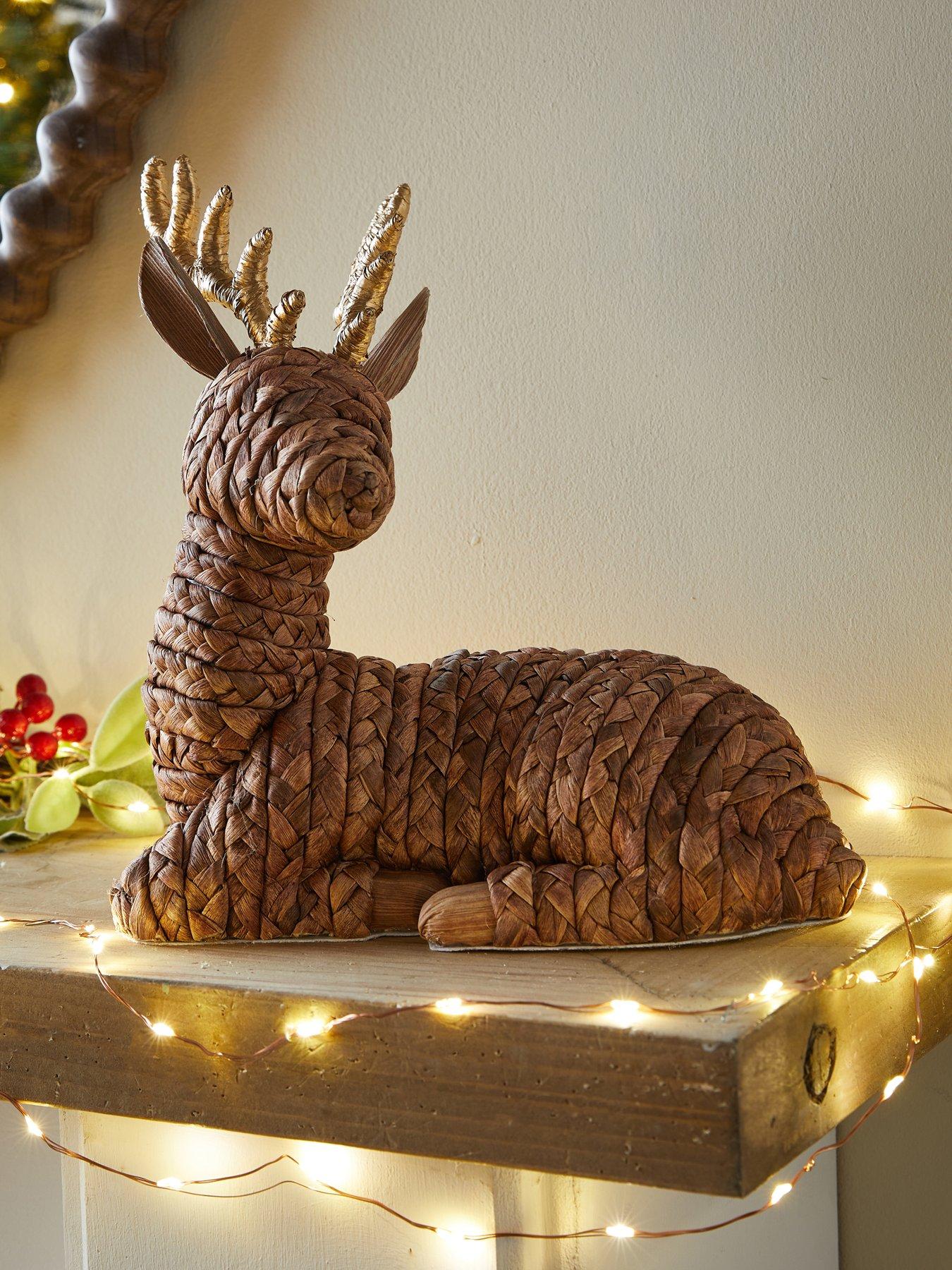 Image 1 of 6 of The Very Collection Rattan Sitting Reindeer Christmas Decoration