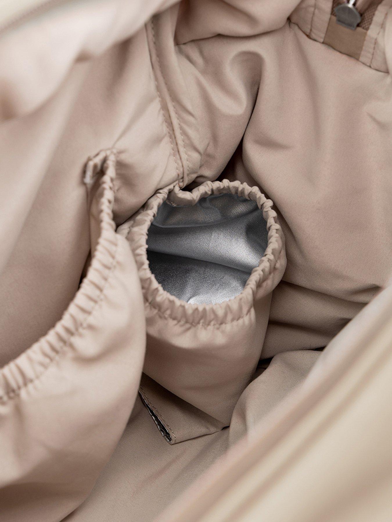  image of done-by-deer-quilted-changing-bag-sand