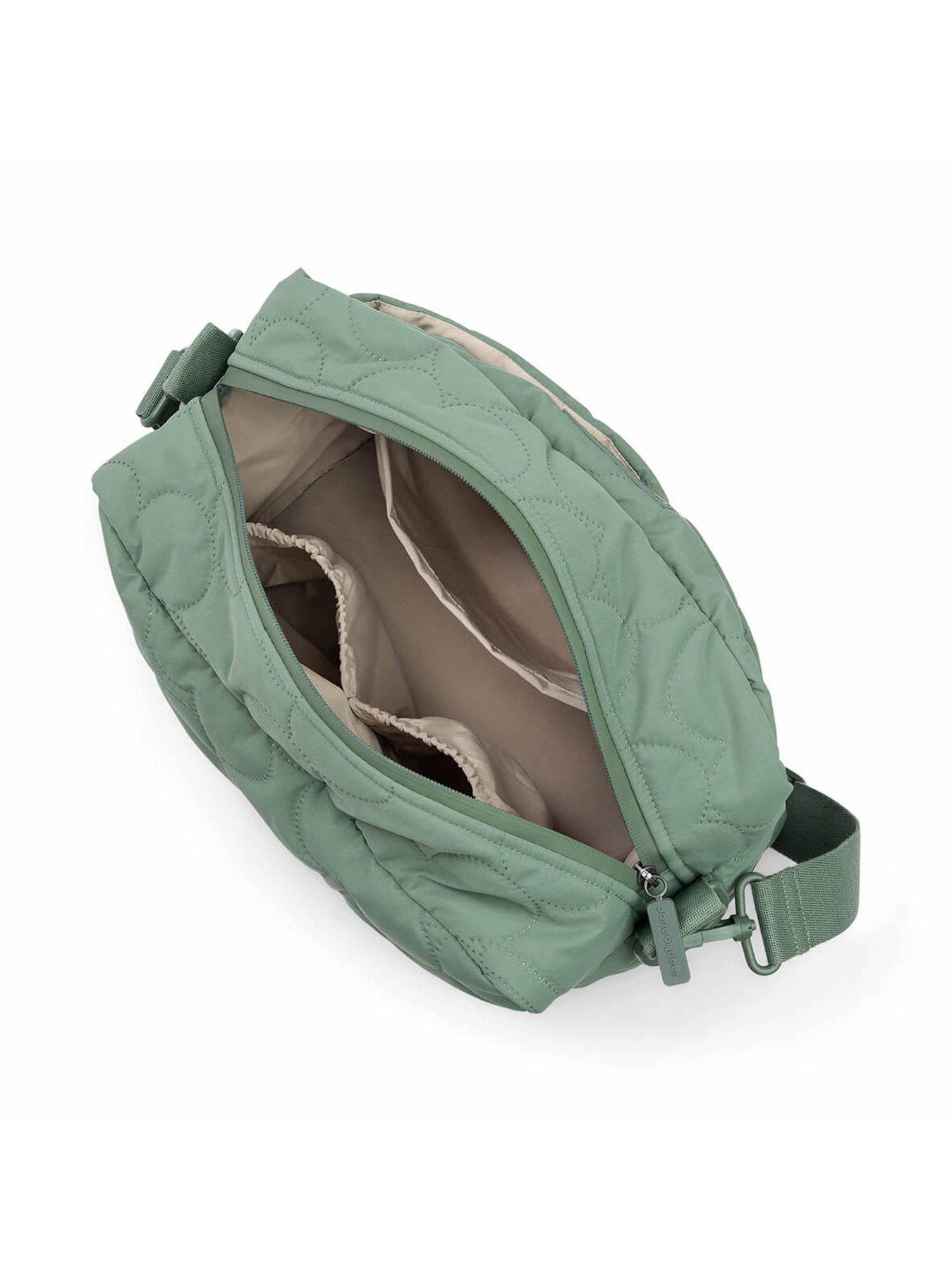  image of done-by-deer-quilted-stroller-bag-green