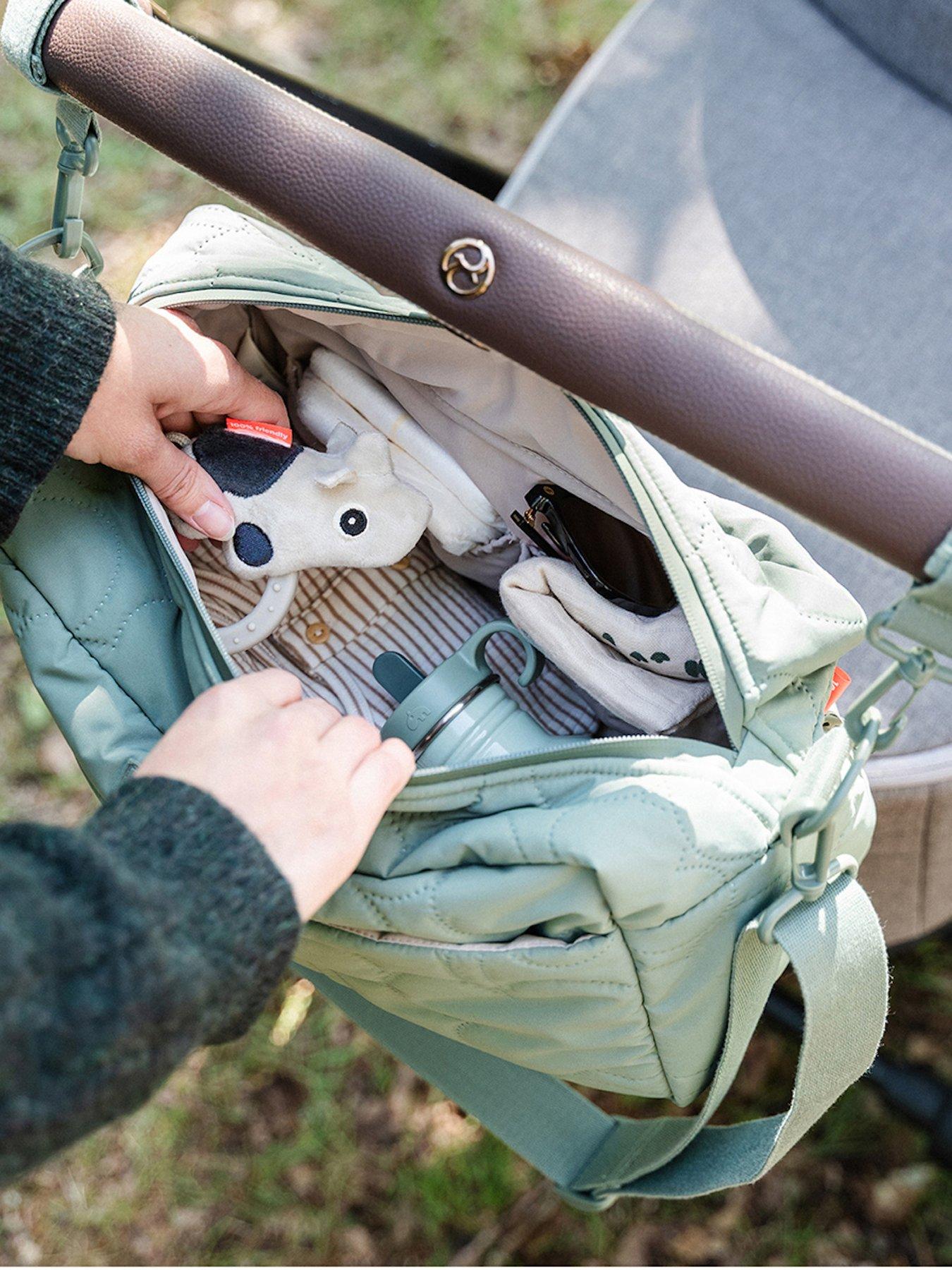  image of done-by-deer-quilted-stroller-bag-green