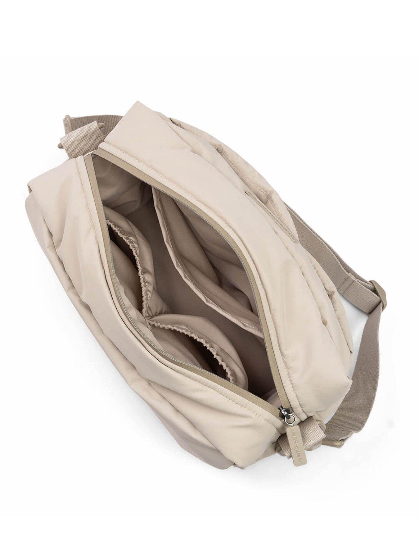  image of done-by-deer-quilted-stroller-bag-sand