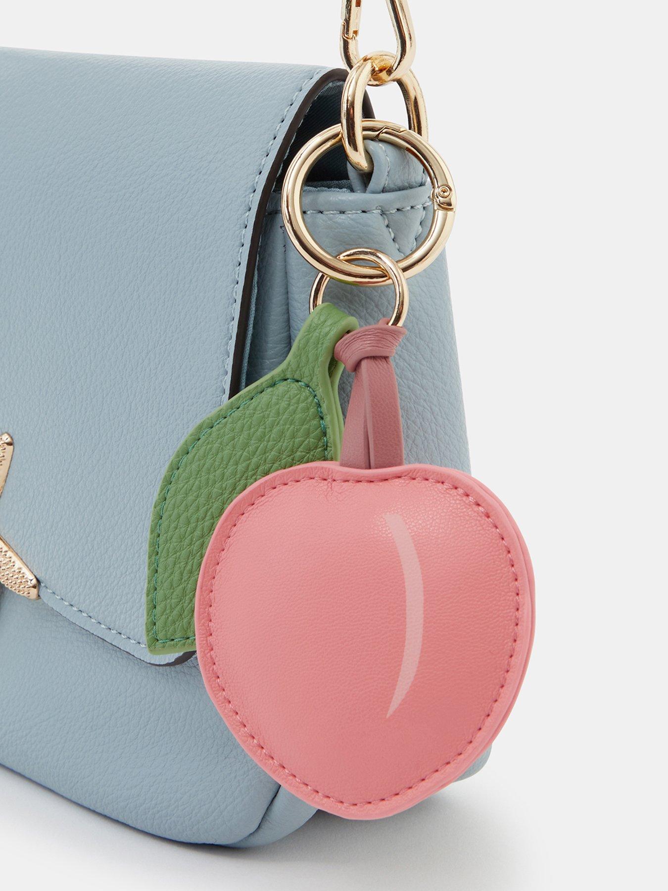  image of accessorize-peach-bag-charm