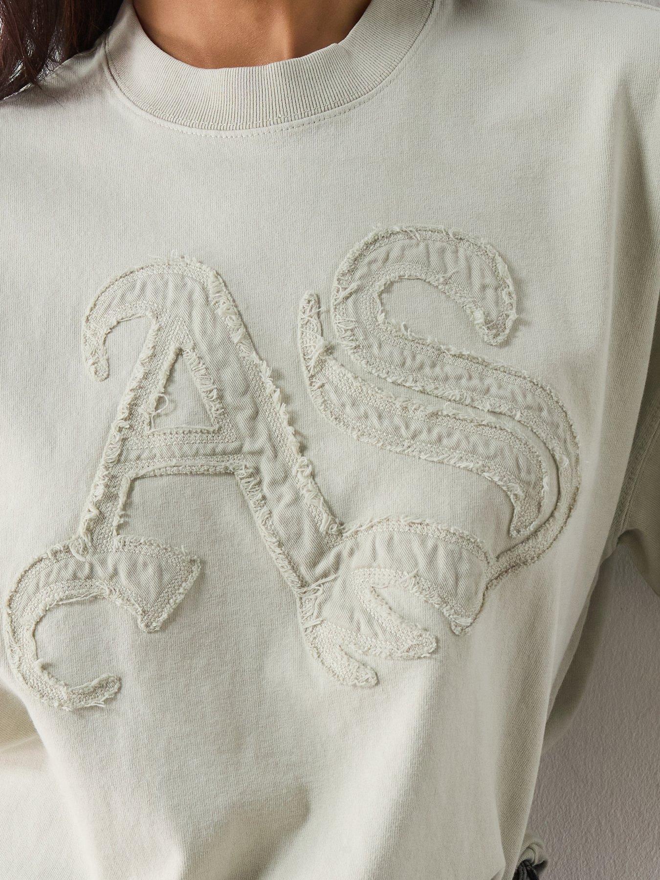 Image 4 of 6 of AllSaints Snarl Etta Logo T-Shirt - Mallow White