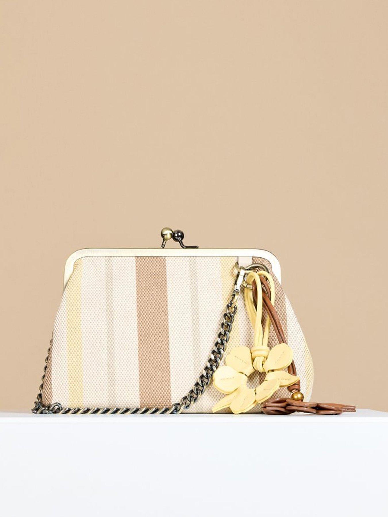  image of little-mistress-stripe-frame-bag