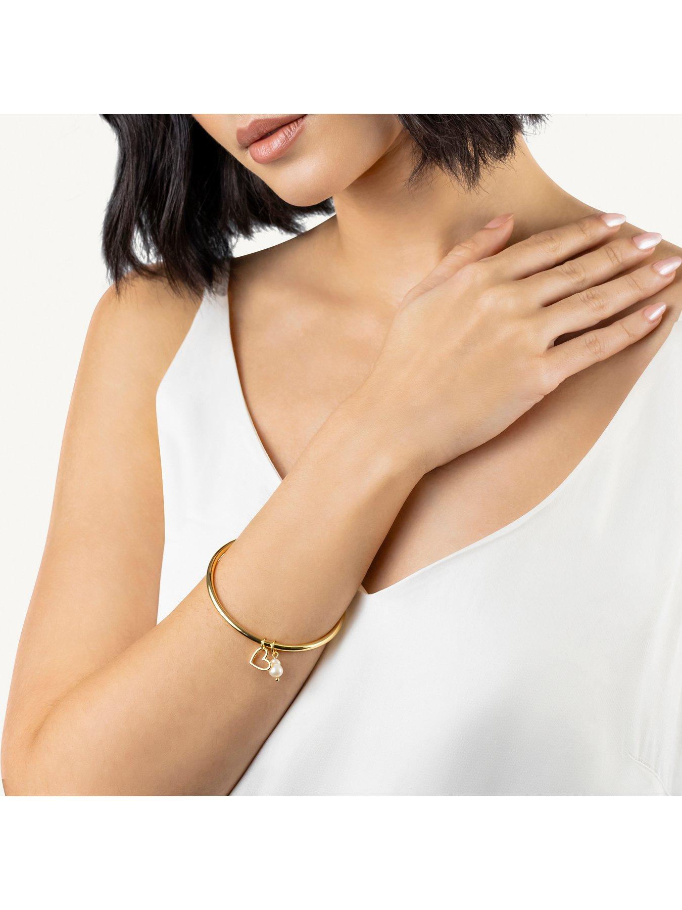 Image 2 of 5 of Radley Gold Bangle with Hanging Charms