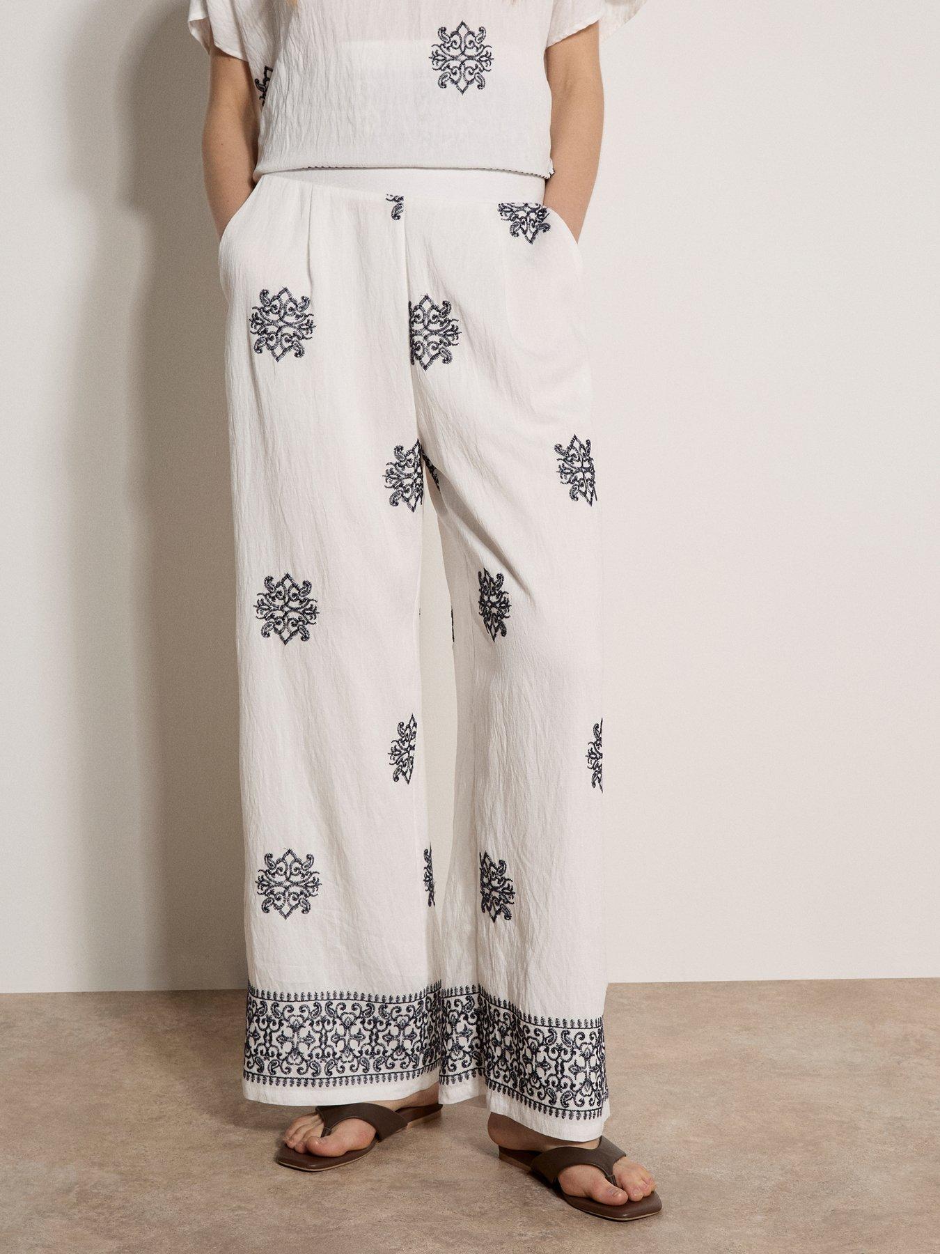 apricot-paisley-border-embroidered-trousers