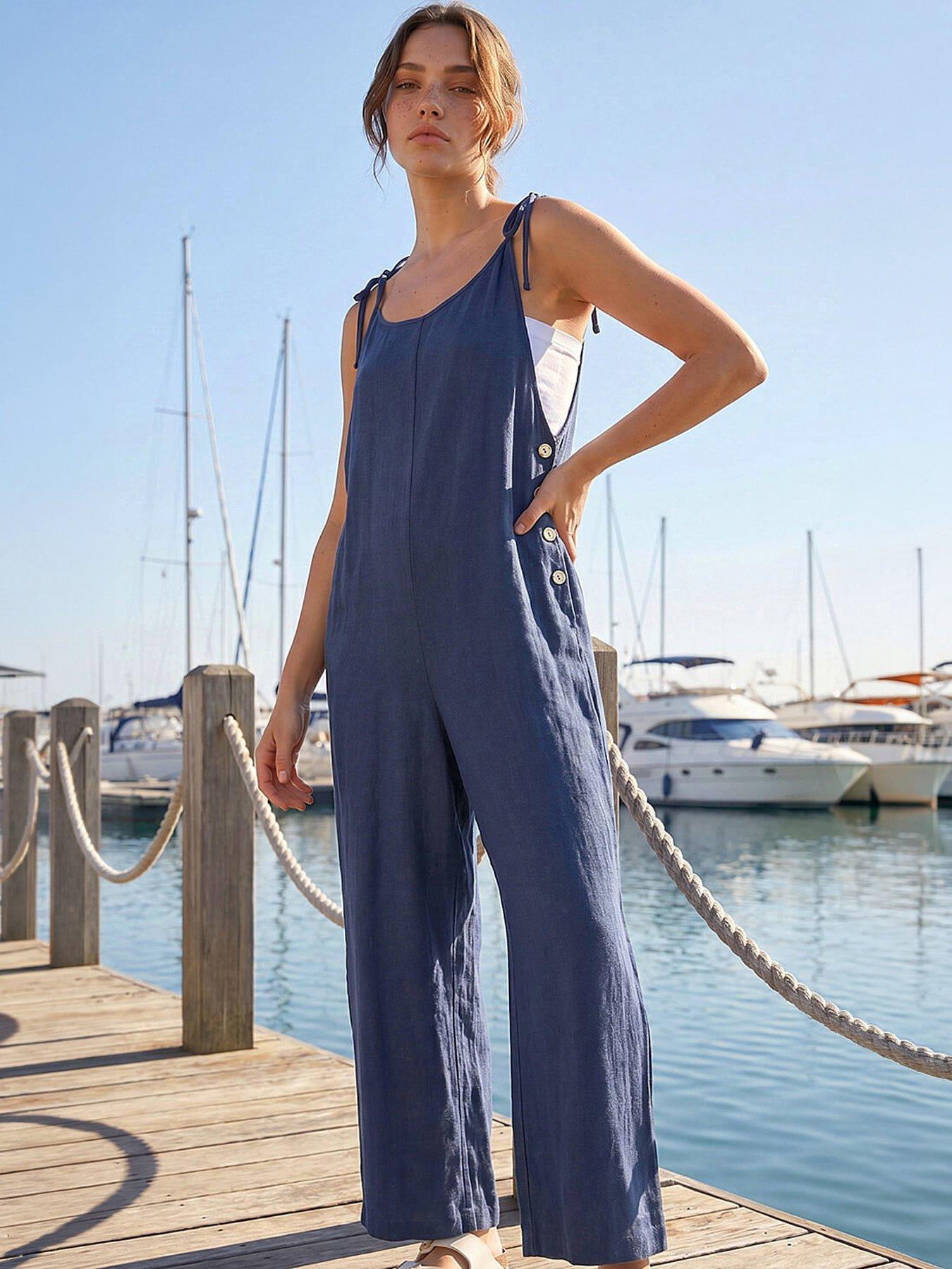 front image of roman-petite-strappy-tie-button-jumpsuit