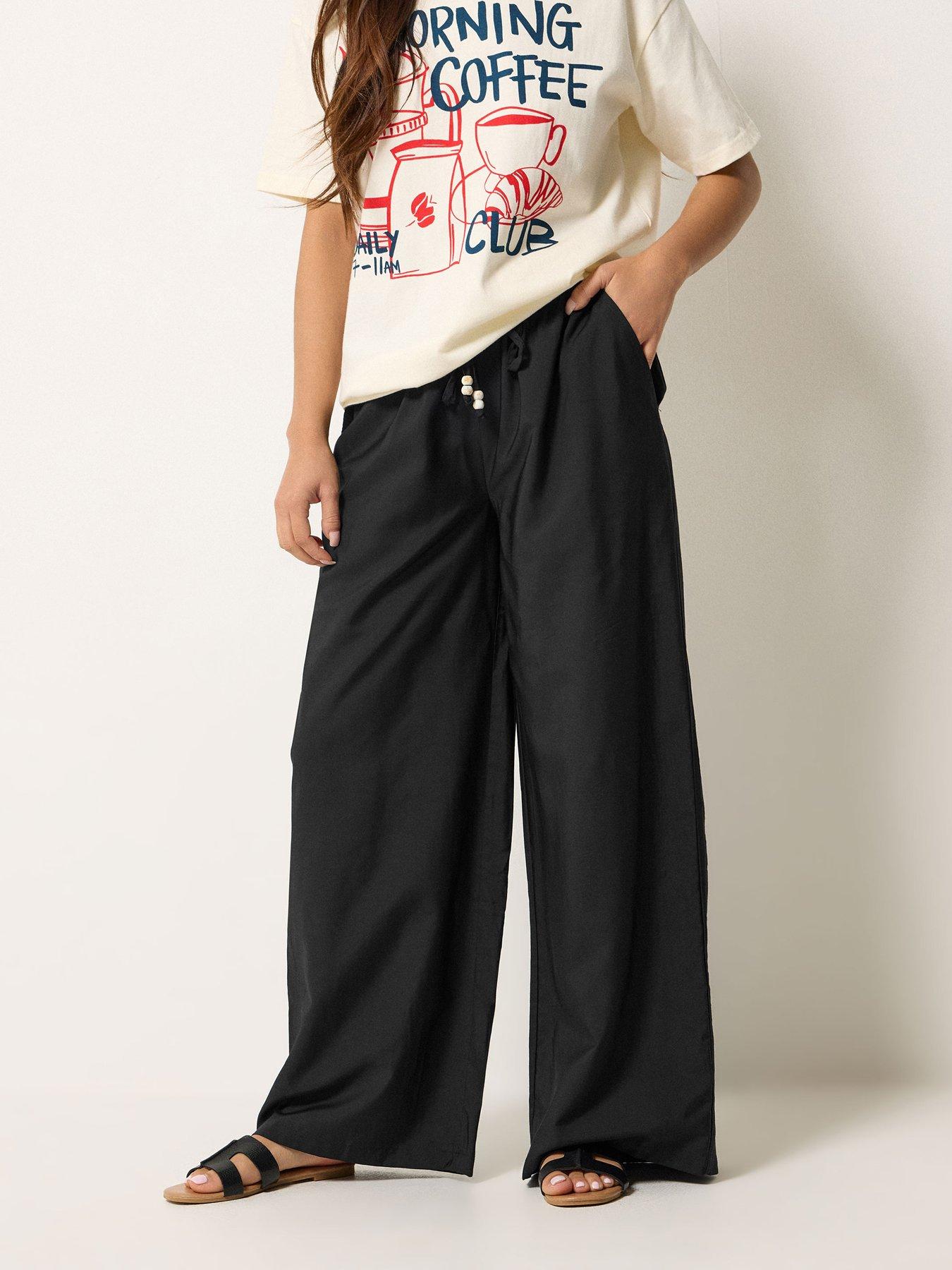 Image 1 of 4 of PixieGirl Petite Shirred Waist Midi Skirt - Black
