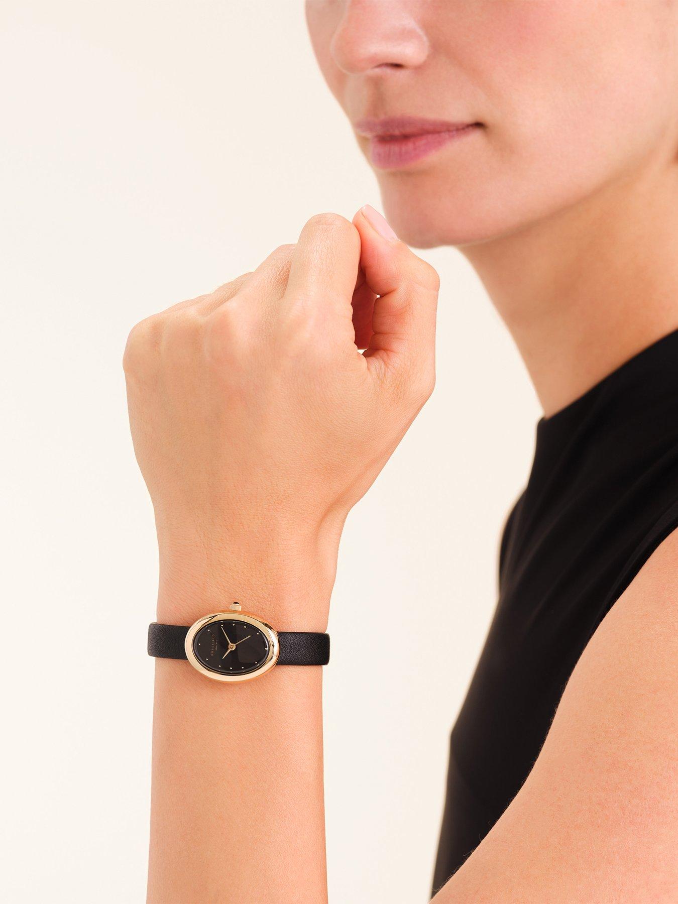  image of rosefield-ovale-gold-case-black-dial-black-leather-strap
