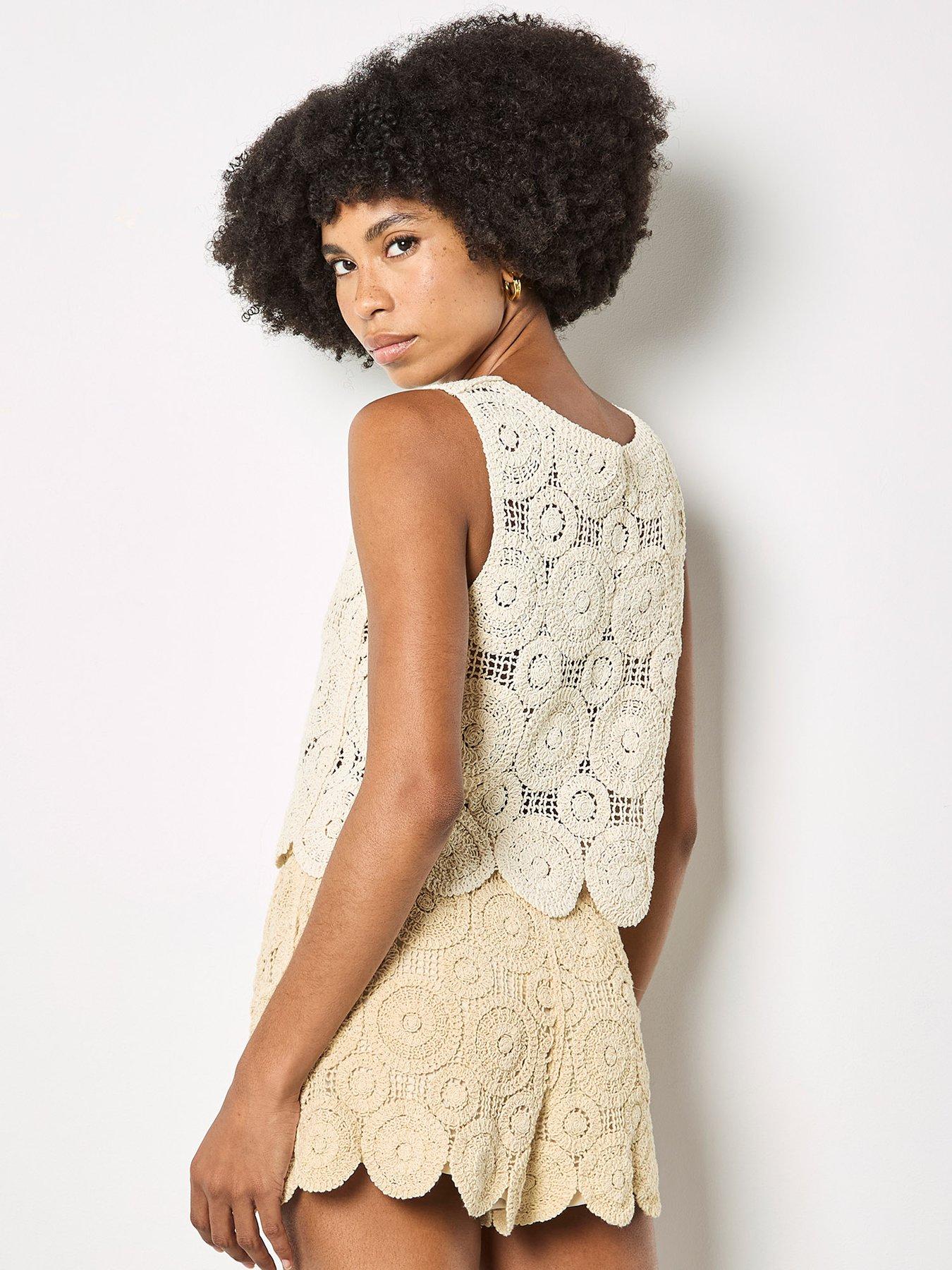  image of apricot-circles-crochet-shell-top-cream