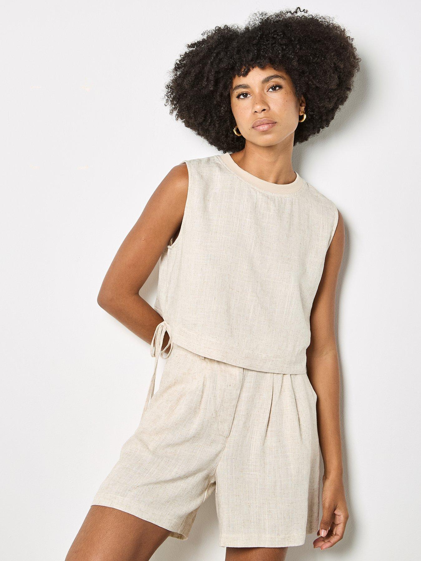 Image 1 of 4 of Apricot Ribbed Neck Side Tie Shell Top - Cream
