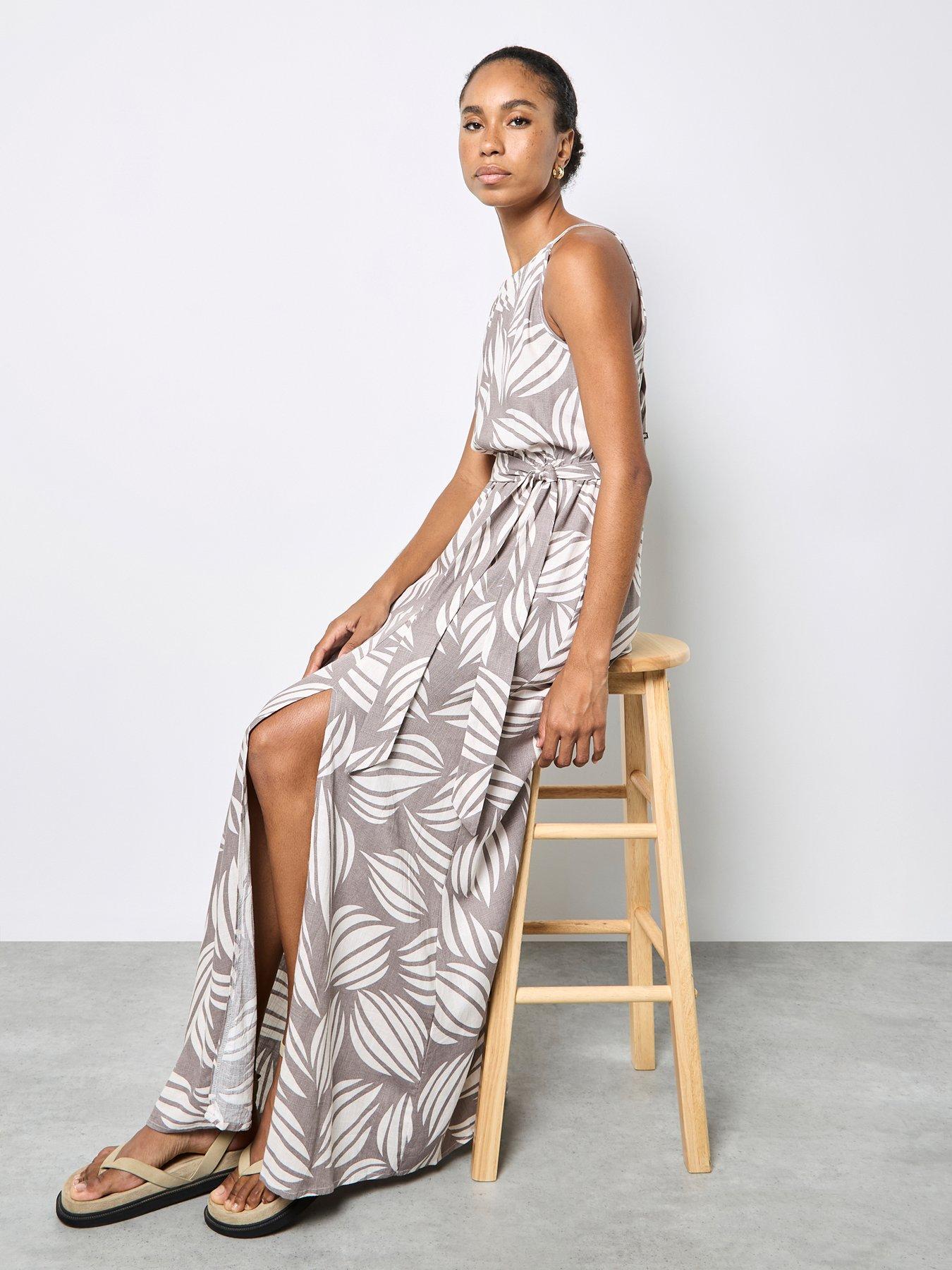  image of apricot-high-neck-shell-print-maxi-dress-cream