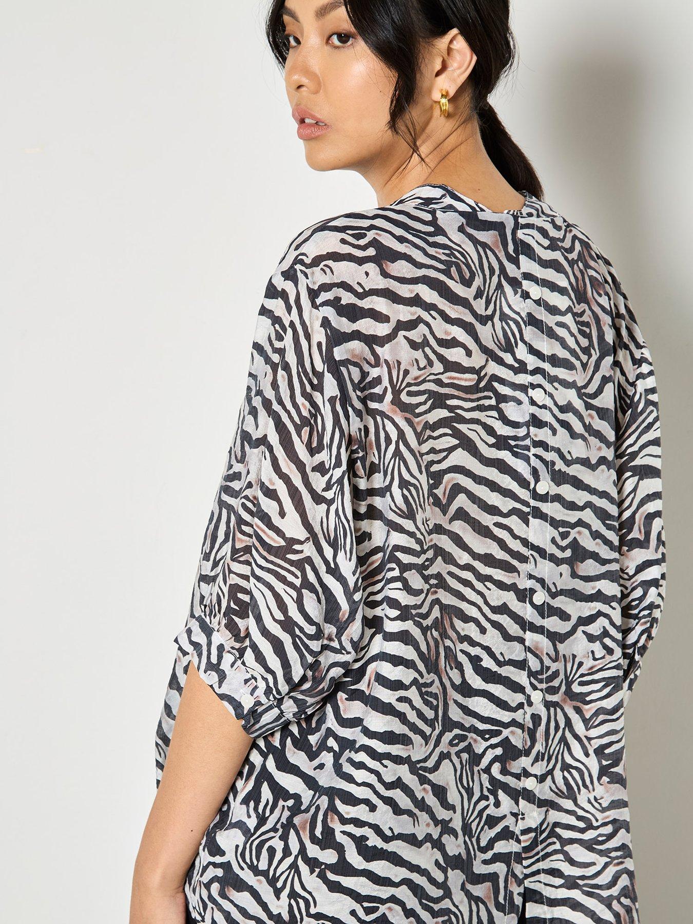 Image 4 of 4 of Apricot Zebra Oversized Semi-Sheer Blouse - White